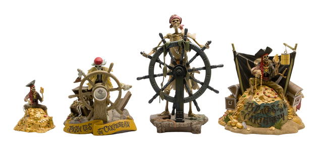 Disney Classics Collection 'Pirates of the Caribbean' Figurine Assortment: Disney Classics Collection 'Pirates of the Caribbean' Figurine Assortment (4) resin items including #4005027 having box, 'It Be Too Late to Alter Course' and (2) seated skeletons Property from: a Priv