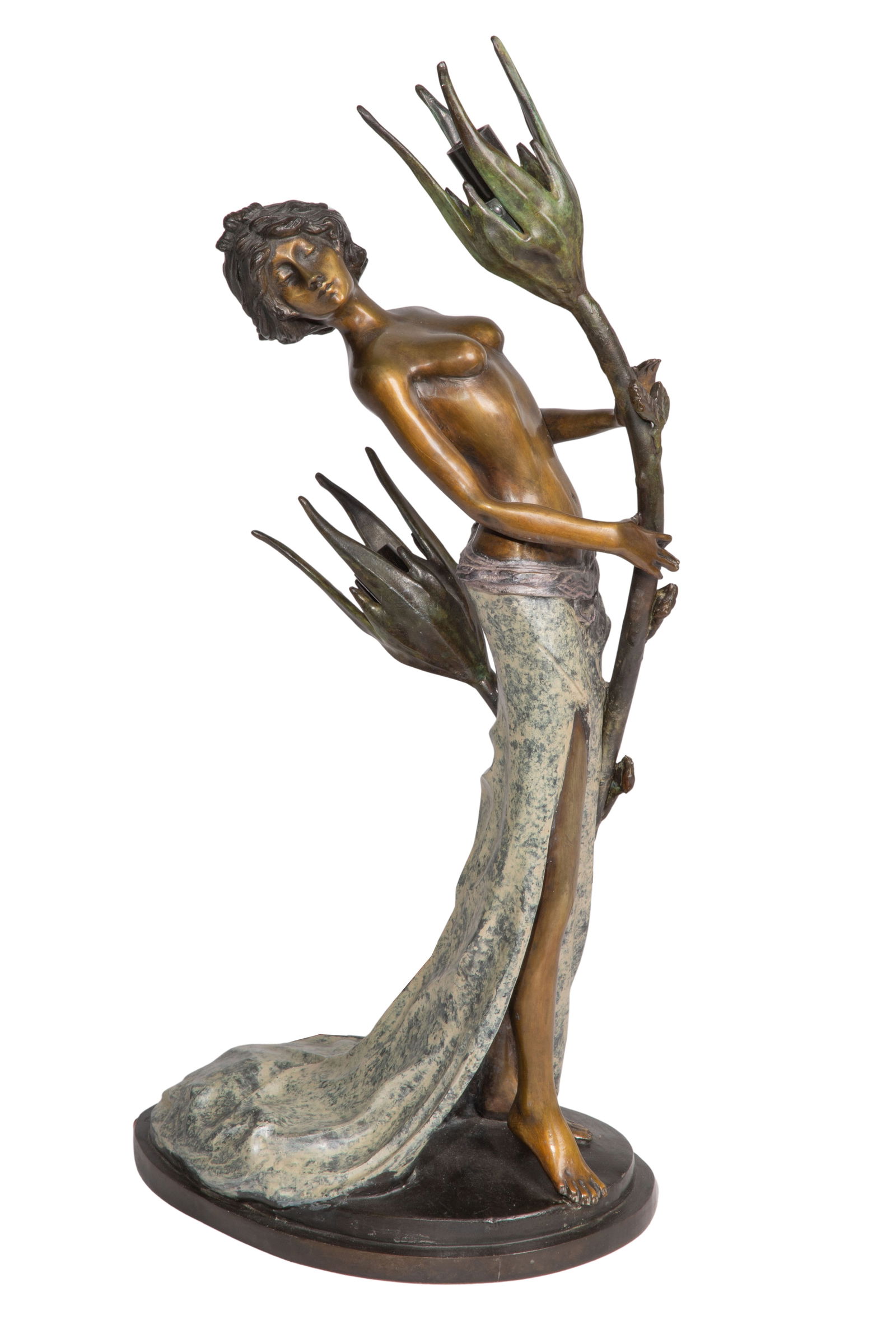 After Demetre Chiparus (Romanian / French, 1886-1947) Bronze Figural Lamp: After Demetre Chiparus (Romanian / French, 1886-1947) Bronze Figural Lamp An unmarked patinated bronze figure having cold painted hair and drapery, holding onto the upper branch of the floral two-ligh
