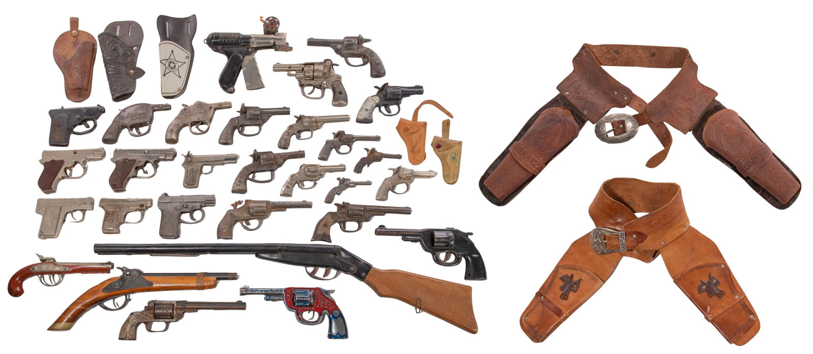 Toy Gun Assortment: Toy Gun Assortment Approximately (25) toy pistols in various shapes, sizes, materials and designs from makers including Hubley, Presto, Echo and National; together with a rifle, belts and holsters Pro