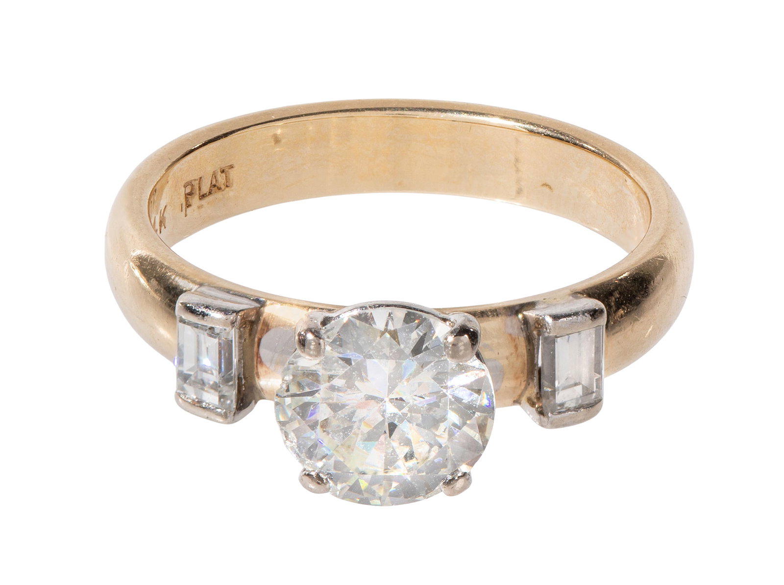 14k Yellow Gold and Diamond Ring: 14k Yellow Gold and Diamond Ring Having a round cut diamond approximately 1.31 carats, J/K color, VS clarity, flanked on each side by baguette cut diamond accents (marked '14k') Property from: an Esta