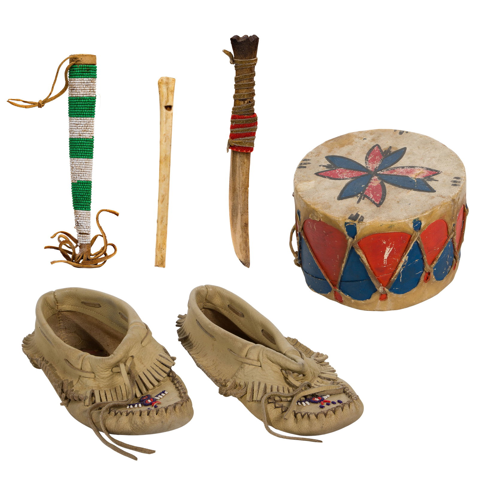 Native American Assortment: Native American Assortment (4) items including a drum having a painted tanned hide on painted spiral-formed cardboard canister section, ink notation 'Hopi Drum Pauhauk', a carved bone whistle in a gre