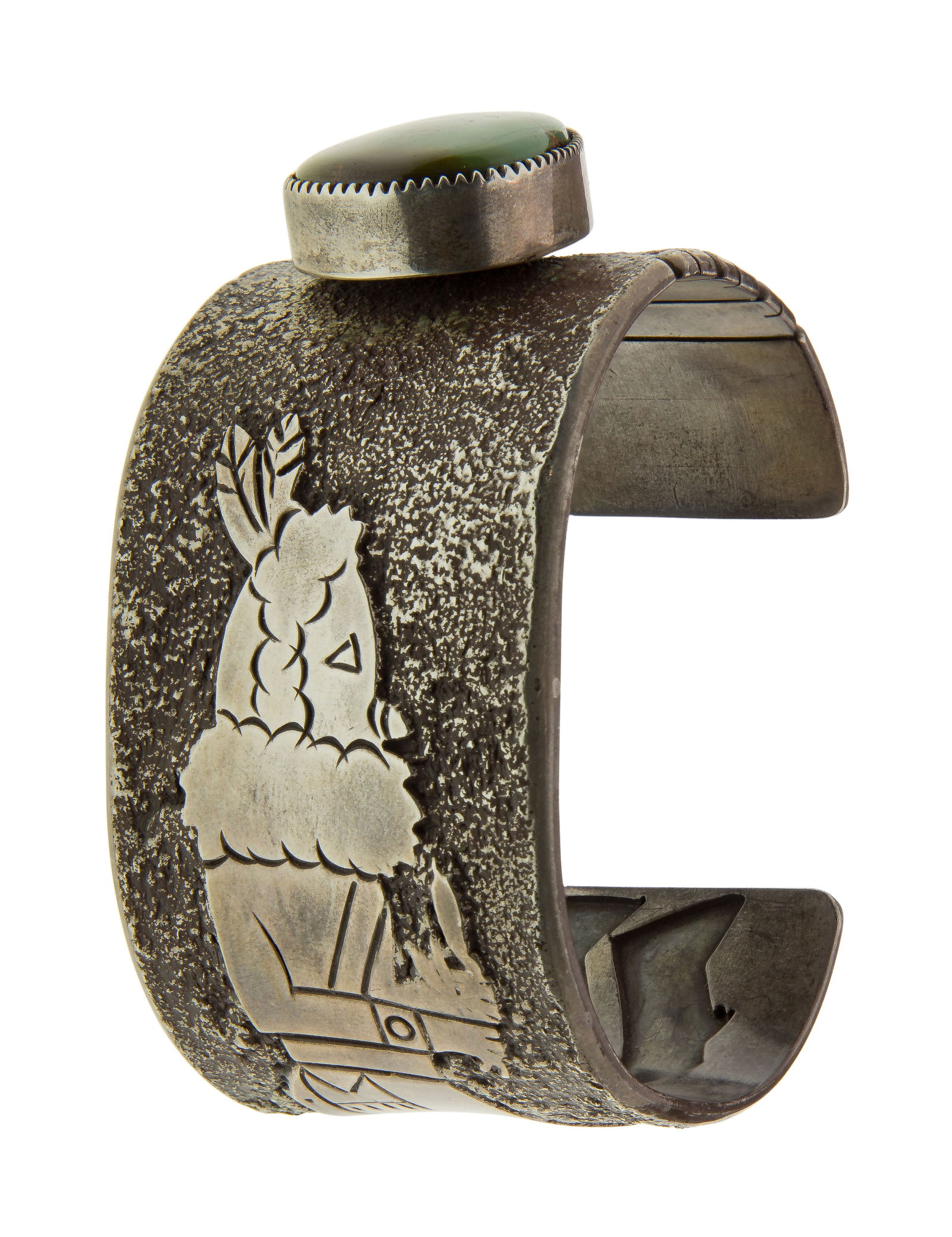 Native American M S Begay Sterling Silver and Turquoise Cuff Bracelet: Native American M S Begay Sterling Silver and Turquoise Cuff Bracelet A cuff bracelet signed 'msBegay' having a free-form cabochon turquoise and an Native American motif (marked 'sterling') Property f