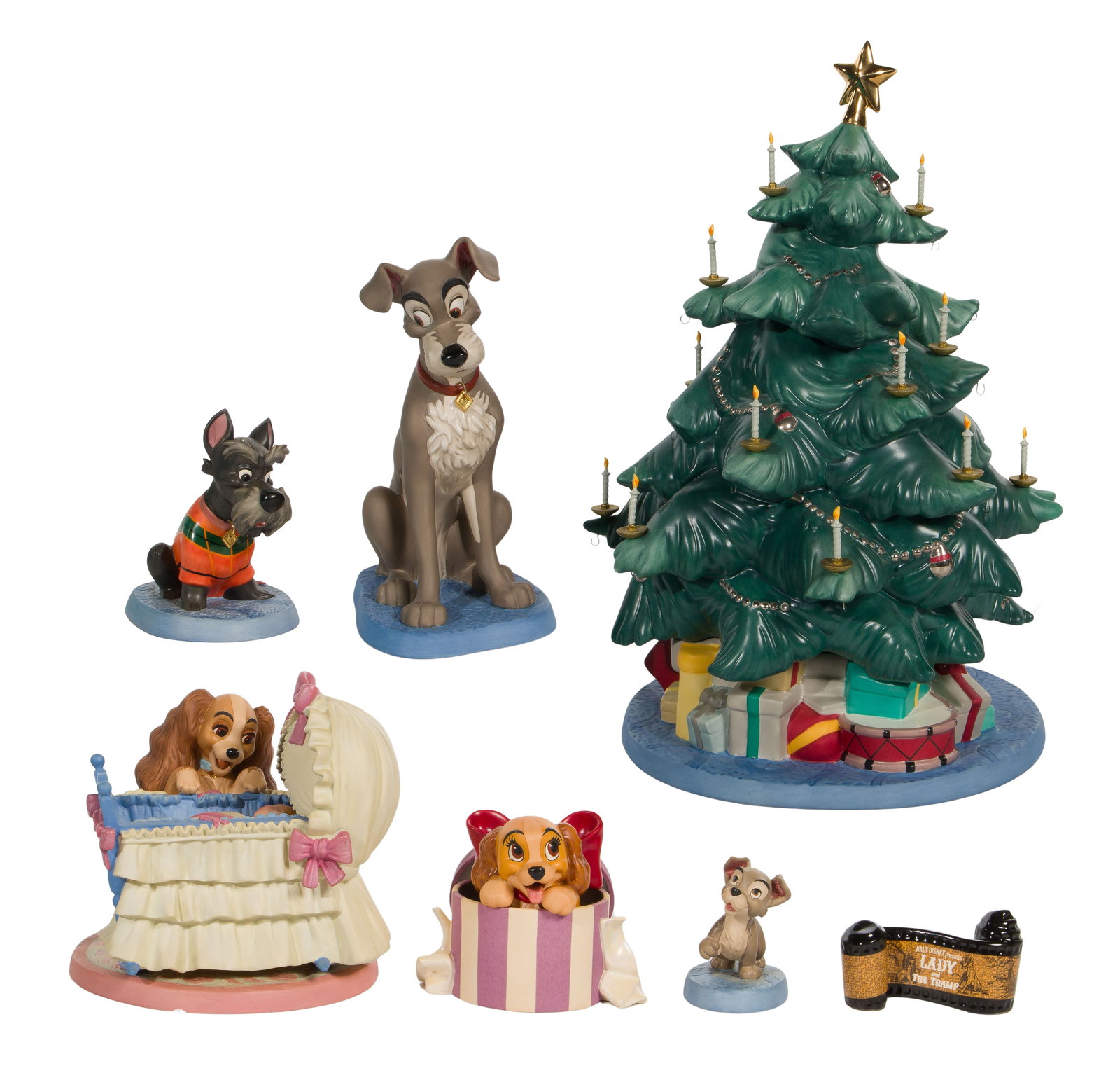 Walt Disney Classics 'Lady and the Tramp' Porcelain Figurines: Walt Disney Classics 'Lady and the Tramp' Porcelain Figurines (7) items including a decorated Christmas tree, Lady, Tramp, Jock, Scamp, Lady and baby and film reel, all having original boxes, some hav