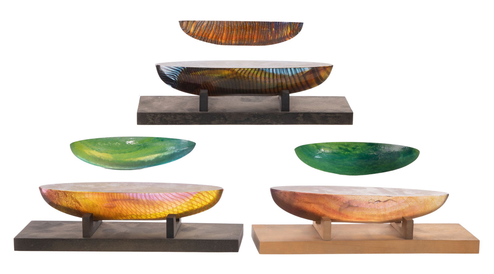 Bertil Vallien for Kosta Boda Art Glass Boats: Bertil Vallien for Kosta Boda Art Glass Boats (6) signed items of various colors and sizes, all having a figure at center, (3) having wood stands, some retaining original labels Property from: a Priva