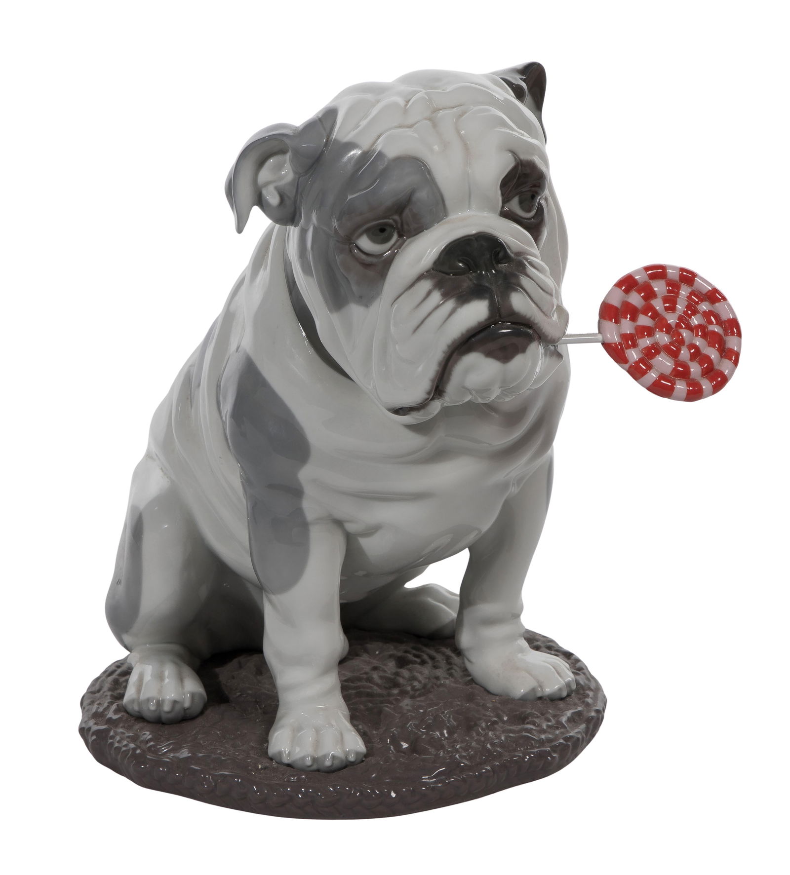 Lladro #9234 'Bulldog with Lollipop' Porcelain Figurine: Lladro #9234 'Bulldog with Lollipop' Porcelain Figurine Property from: a Private Collector, Mendota, Illinois Height: 13 inches, Width: 13 inches, Depth: 10 1/4 inches Condition: overall light wear co