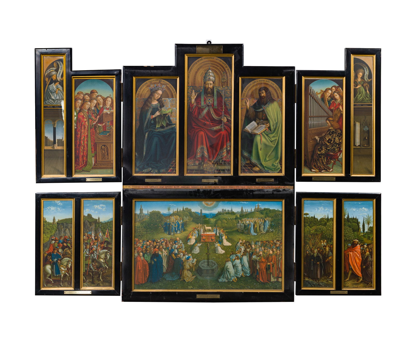 After Jan Van Eyck (Flemish, 1390-1441) The Ghent Altarpiece Triptych: After Jan Van Eyck (Flemish, 1390-1441) The Ghent Altarpiece Triptych Chromolithographs framed in a walnut folding triptych, having a placard on interior Property from: an Estate, Park Ridge Illinois
