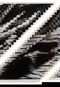 Dieter Appelt (German, b.1935) Photograph: Dieter Appelt (German, b.1935) Photograph Having dated '1982' printers rubber stamp and photographer's rubber stamp 'D. Appelt' verso, depicting a draped female body on a wood pallet, loose sheet Prop