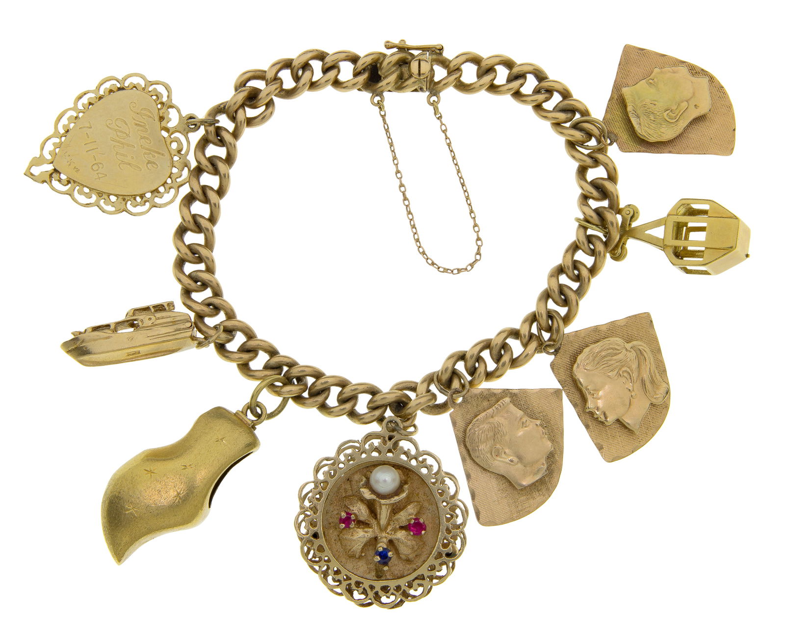 18k and 14k Charms on 14k Yellow Gold Bracelet: 18k and 14k Charms on 14k Yellow Gold Bracelet Curb link bracelet having eight charms (bracelet and most charms marked '14k', gondola marked '18k') Property from: an Estate, Chicago (Near North Side),