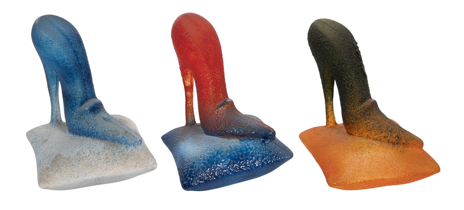 Kjell Engman for Kosta Boda 'Catwalk Series' Art Glass: Kjell Engman for Kosta Boda 'Catwalk Series' Art Glass (3) items depicting high heel shoes on pillows, in blue and white, black and orange and red and blue, all having Kosta Boda labels, engraved mark