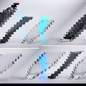 Orrefors Crystal and Art Glass: Orrefors Crystal and Art Glass (6) total items including a 'Nefertiti' and (2) 'Ramses' crystal face vases by Martti Rytkonen and a bottle vase by Helen Krantz for Orrefors; together with (2) stylized