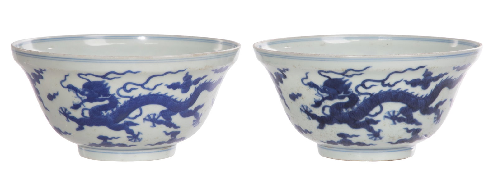 Chinese Blue and White Porcelain Bowls: Chinese Blue and White Porcelain Bowls A pair having underglaze blue dragon and cloud decoration, Daoguang archaic seal mark to undersides Property from: a Private Collector, Sanford, Florida Height: 