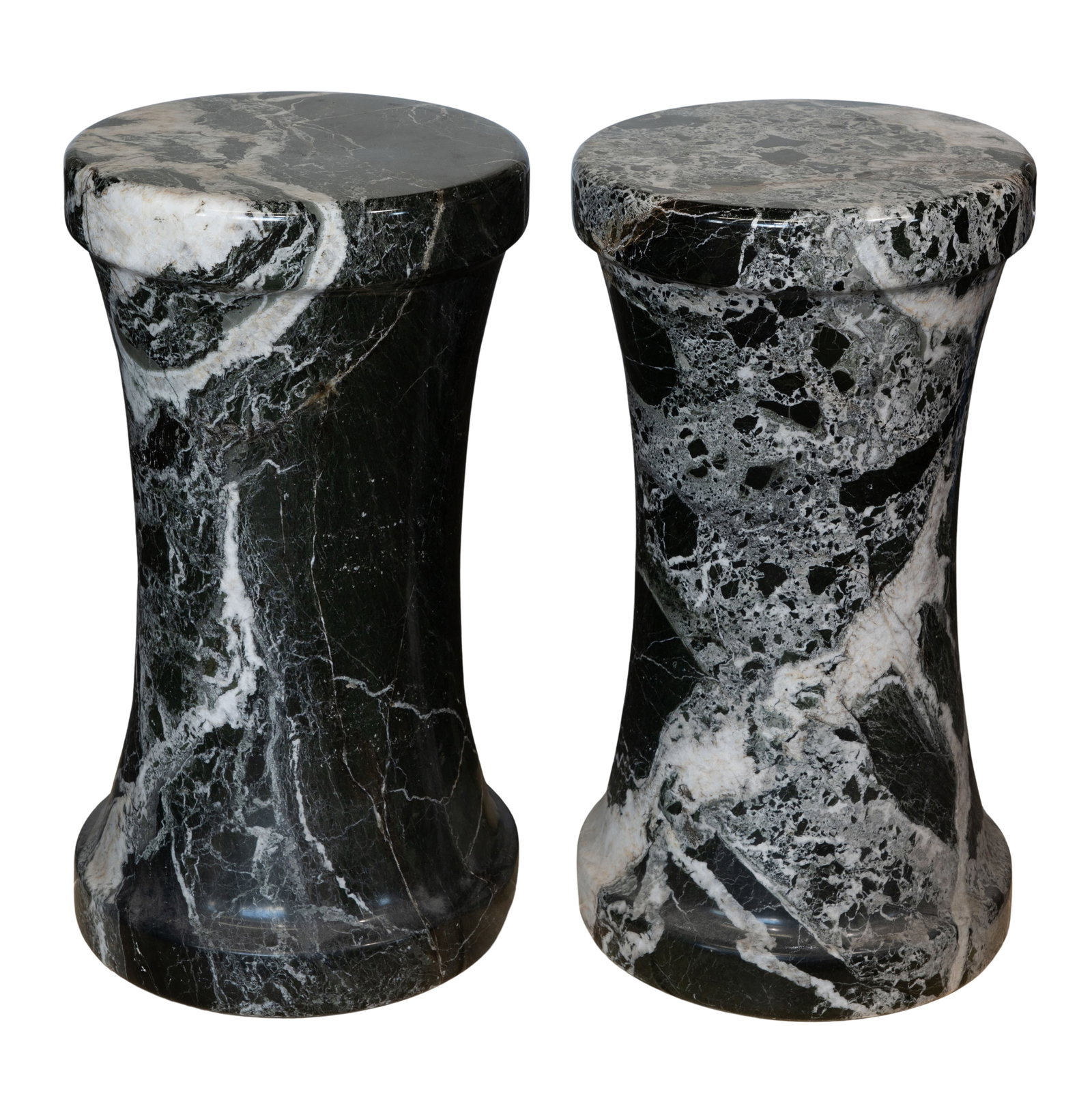 Marble Pedestals: Marble Pedestals A pair of black and white brecciated marble cylindrical pedestals having slight waists and raised bands at tops and feet Property from: a Private Collector, Chicago (Edgewater), Illin