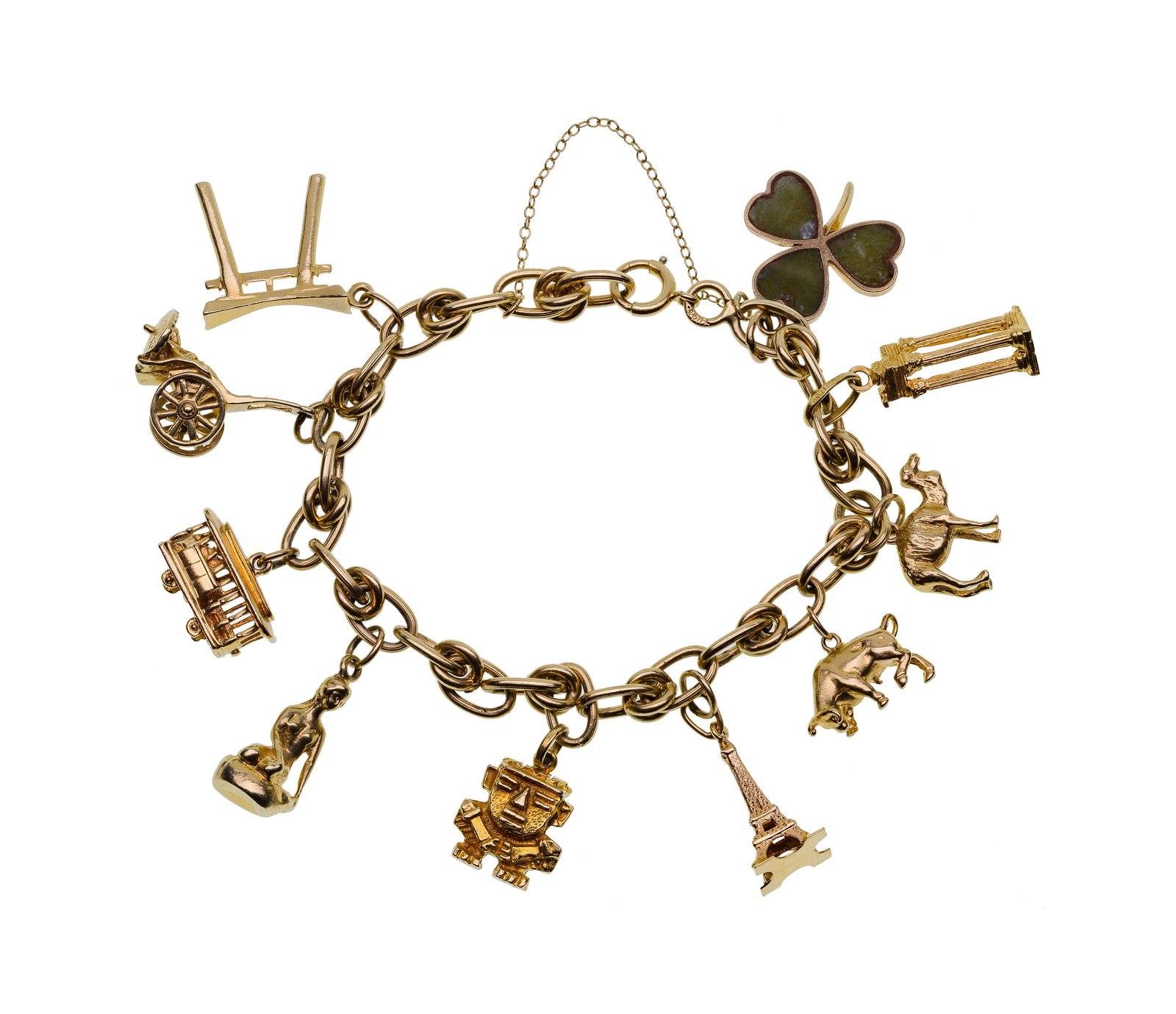 14k Yellow Gold Bracelet Having Mixed Gold Charms: 14k Yellow Gold Bracelet Having Mixed Gold Charms Chain charm bracelet having ten charms (bracelet and some charms marked '14k') Property from: an Estate, Chicago (Lakeview), Illinois Length: 7 inches