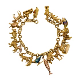 18k Yellow Gold Bracelet Having Mixed Gold Charms