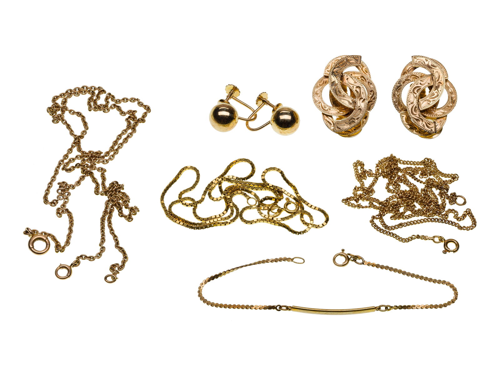 14k Yellow Gold Jewelry Assortment: 14k Yellow Gold Jewelry Assortment (6) items including (2) necklaces, a bracelet, a watch chain, a pair of clip-back earrings and a pair of screw-back earrings (most marked '14k') Property from: an Es