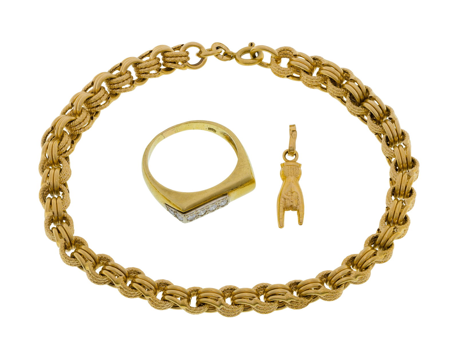 18k Yellow Gold Jewelry Assortment: 18k Yellow Gold Jewelry Assortment (3) items including a triple loop bracelet, a ring having six round cut diamonds and a Mano Cornuto hand charm (all marked '18k' / '750') Property from: an Estate, G