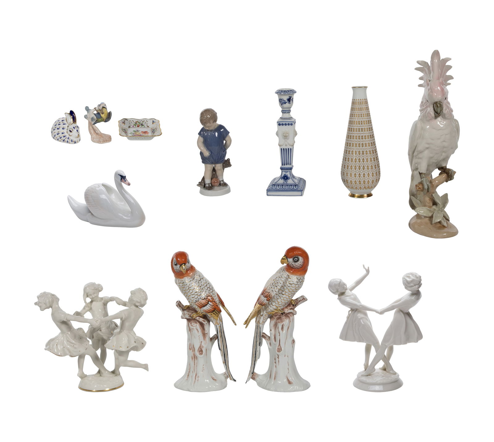 European Porcelain Figurine Assortment: European Porcelain Figurine Assortment (12) items including a swan, a boy and teddy bear and a candlestick from Royal Copenhagen, a Royal Crown Derby marked bunny, a Royal Dux cockatoo, a pair of parr