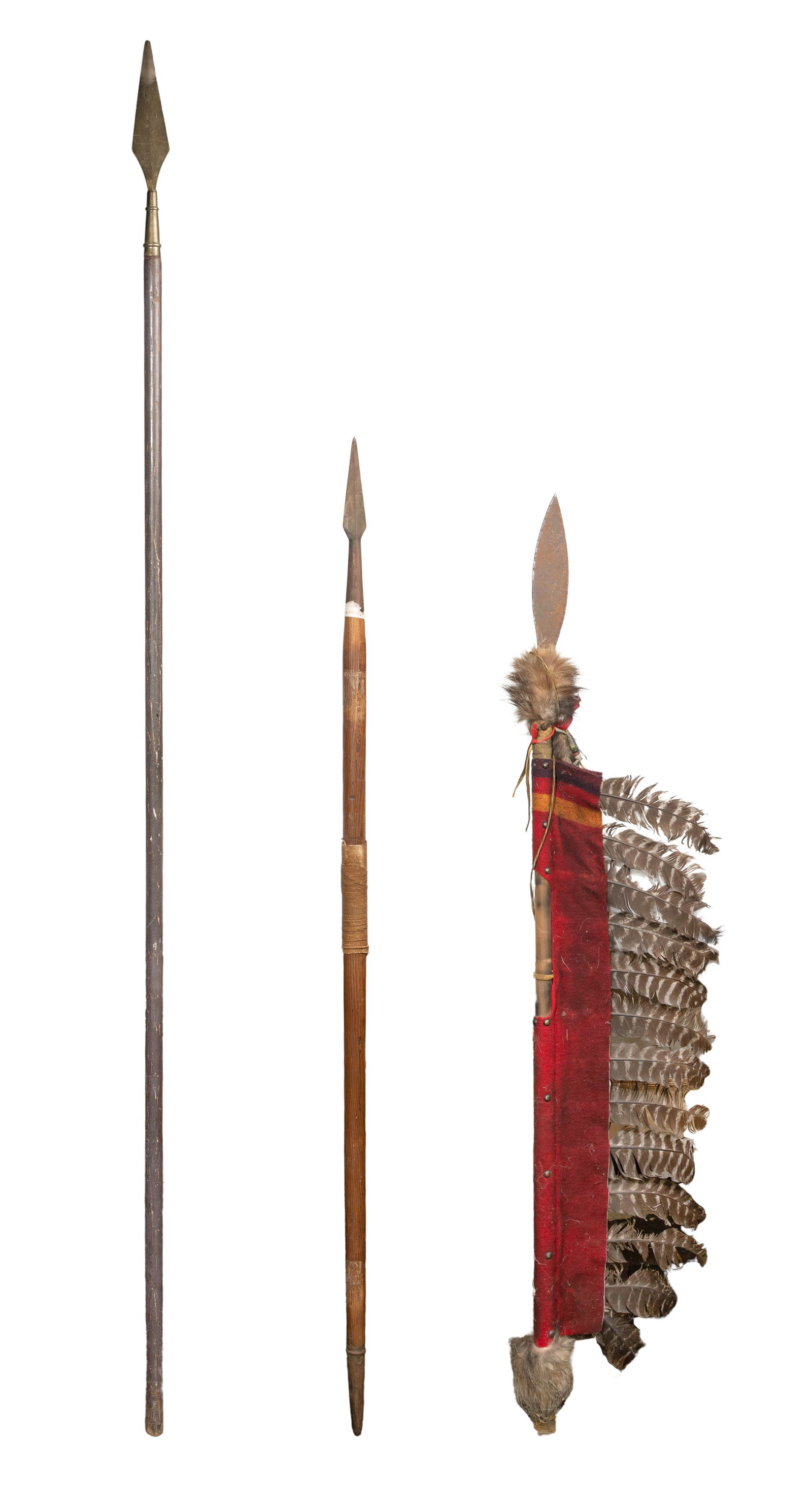 Ethnographic Spear Assortment: Ethnographic Spear Assortment (3) items including a cloth and feather covered shaft Property from: an Estate, Downers Grove, Illinois Length: 67 inches, Width: 1 inches (longest) Condition: overall mo