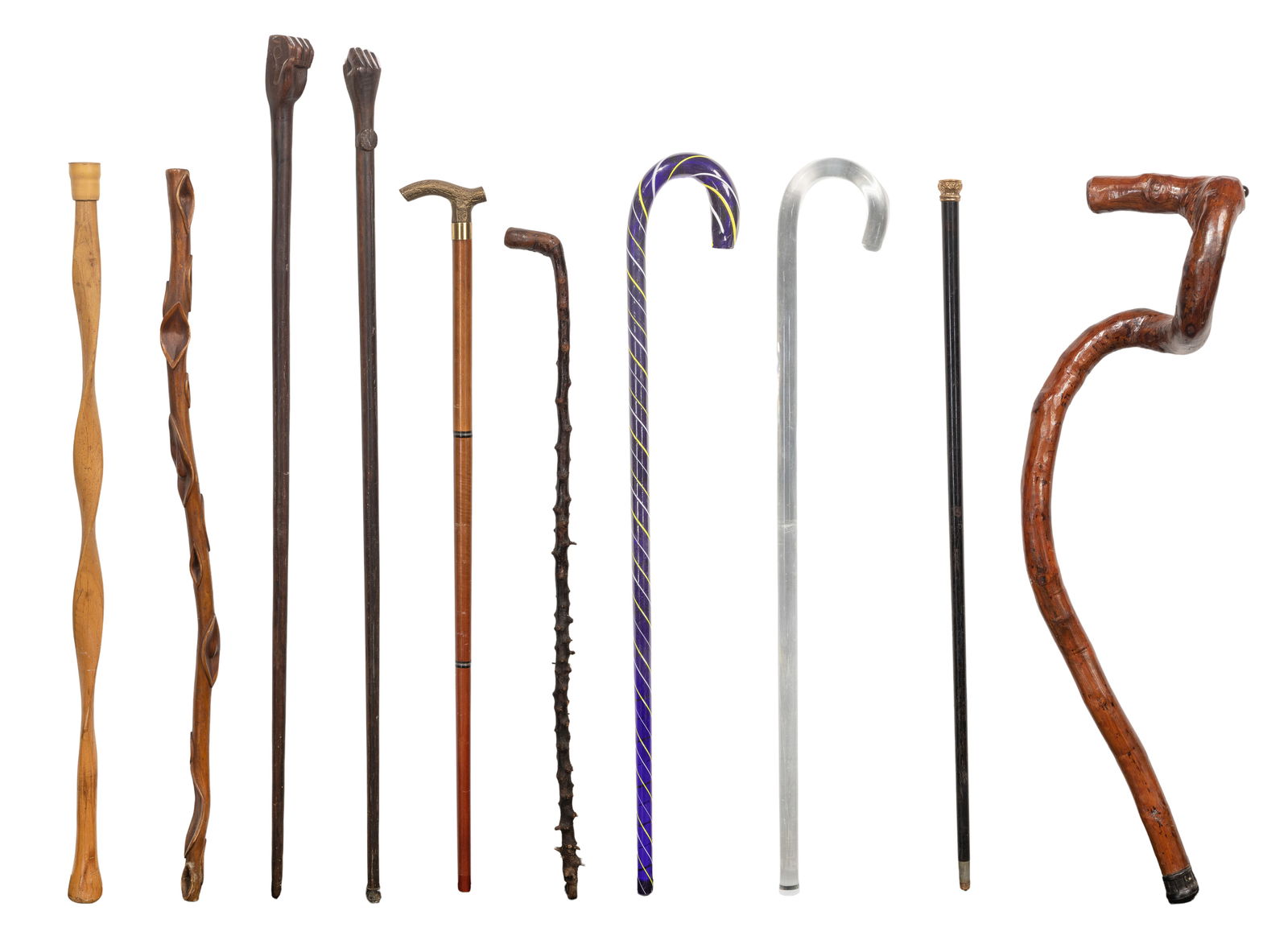 Cane and Walking Stick Assortment: Cane and Walking Stick Assortment (10) items of various forms, sizes and materials Property from: an Estate, Chicago, Illinois Height: 40 inches, Diameter: 1 1/2 inches (longest) 