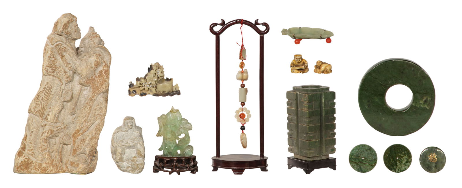 Asian Stone Object Assortment: Asian Stone Object Assortment (13) items including hand carved jadeite jade and hardstone figures, bowls, discs, netsukes, a bi, some having stands Property from: an Estate, Johnsburg, Illinois Height