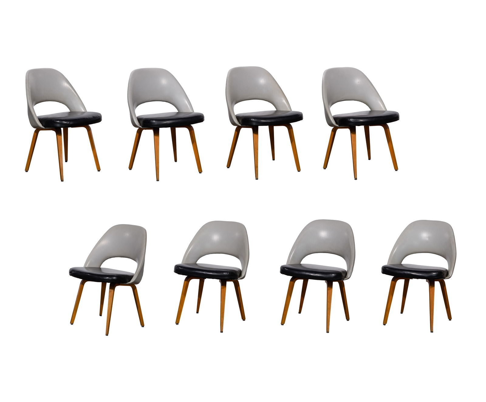 Eero Saarinen for Knoll Model 72 Executive Leather Chairs: Eero Saarinen for Knoll Model 72 Executive Leather Chairs A set of (8) chairs having bentwood legs, upholstered in two tone black and grey leather Property from: an Estate, Kenilworth, Illinois