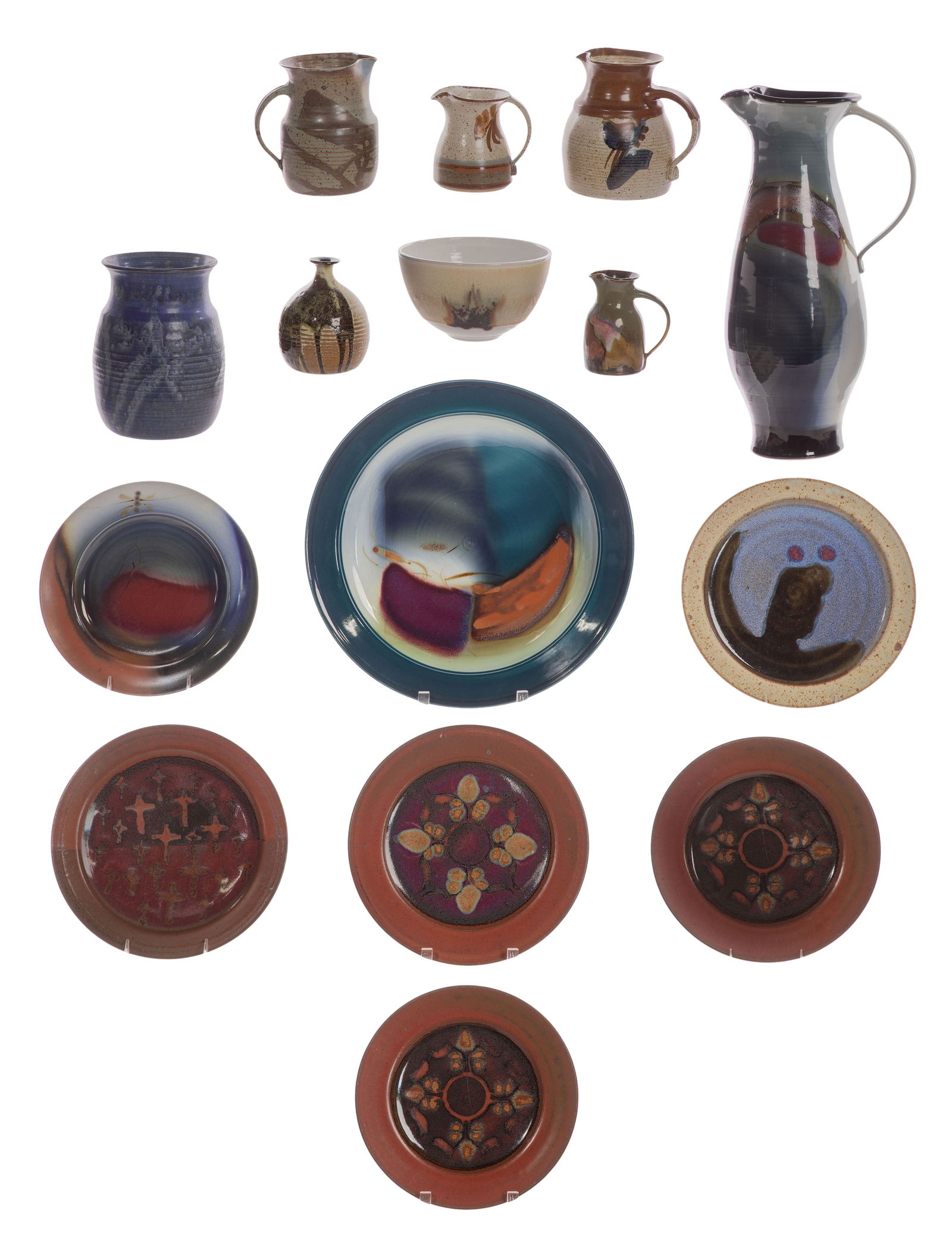Alan Viglund (American, 1941-2015) Studio Pottery Assortment: Alan Viglund (American, 1941-2015) Studio Pottery Assortment (15) items including (6) plates, (4) pitchers, (2) vases, a ewer, a bowl and a charger, all having various color glazes and incised