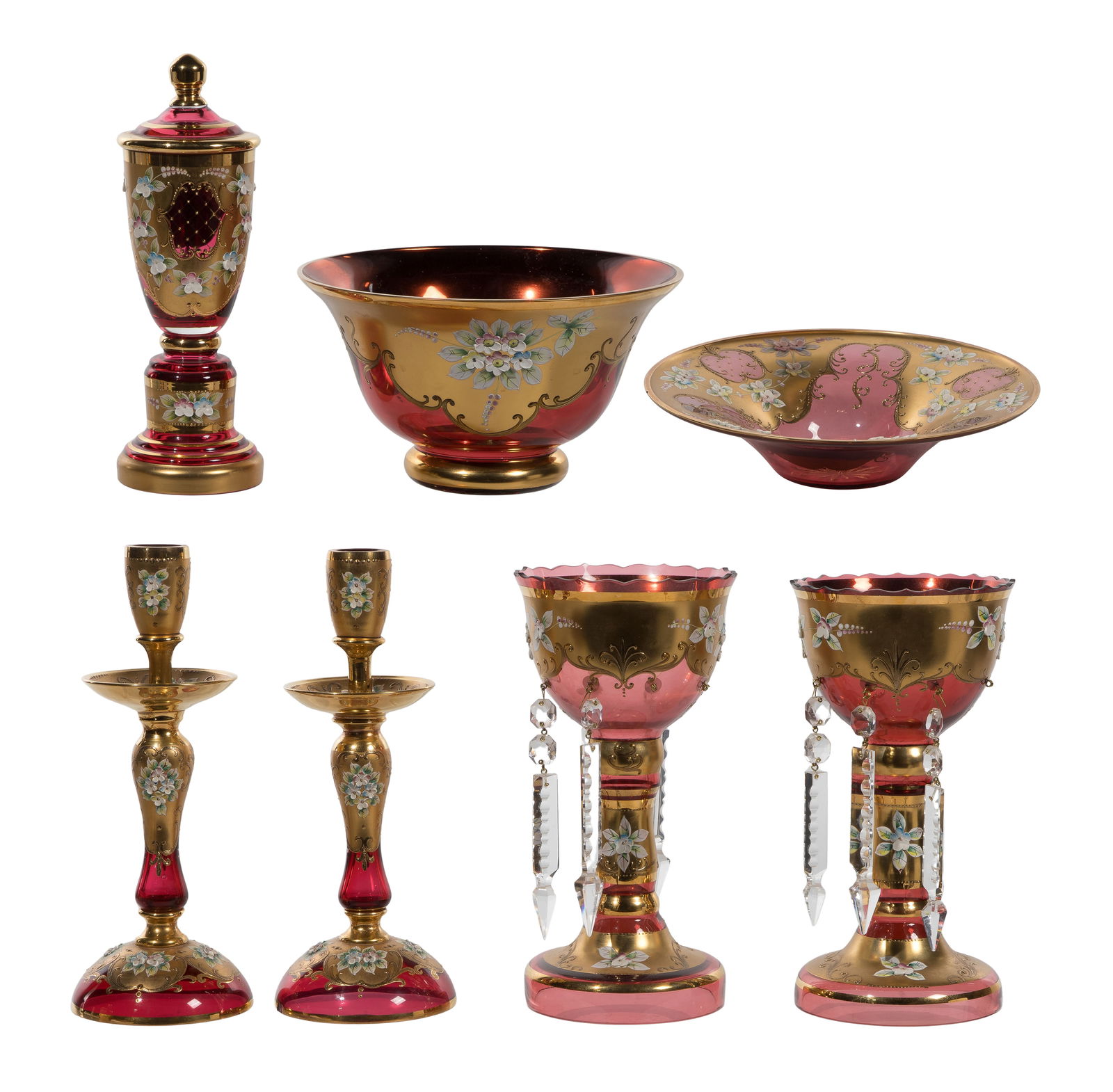 Gilt Cranberry Glass Assortment: Gilt Cranberry Glass Assortment (7) items including (2) bowls, a lidded urn, a set of (2) mantle lusters having crystal accents and a set of (2) candlesticks, all having gilt and enamel floral