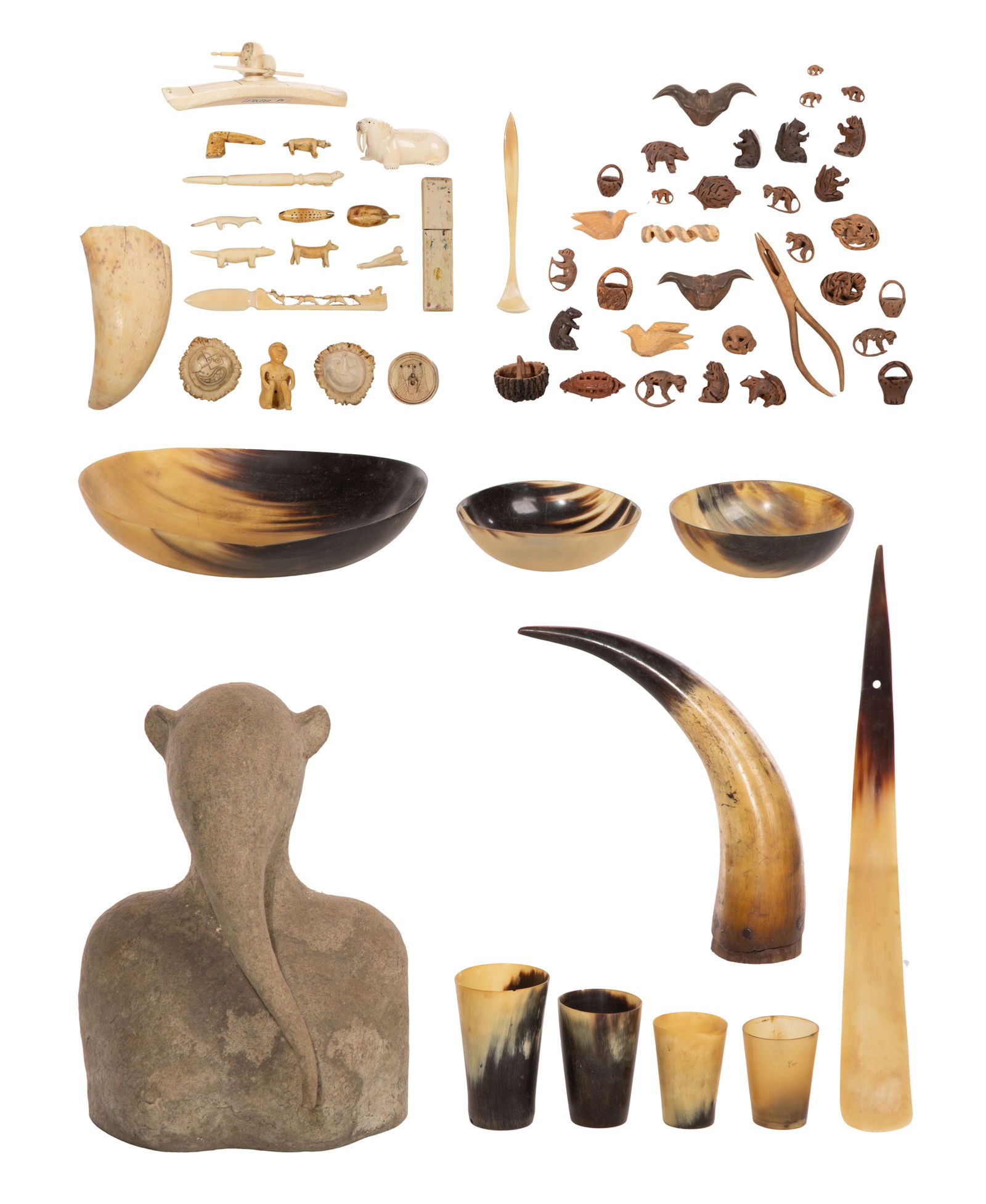 Inuit Carving Assortment: Inuit Carving Assortment Approximately (35) total items of various forms, sizes and materials including bone, wood, horns and nut shells; together with a papier mache bust Property from: an Estate, Ch