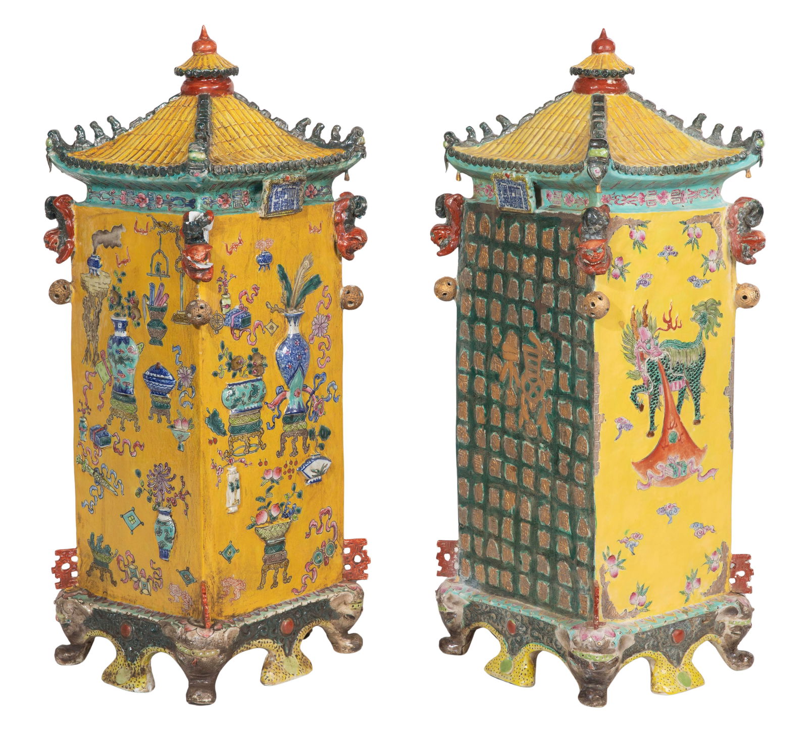 Chinese Famille Jaune Porcelain Altar Garnitures: Chinese Famille Jaune Porcelain Altar Garnitures A like pair, pagoda shaped and roofed in yellow, one having all sides decorated by raised enamel auspicious symbols on yellow ground, the other