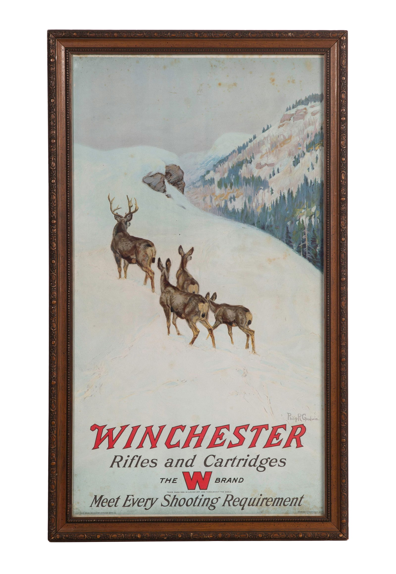 1912 Winchester Rifles and Cartridges Chromolithograph Sign: 1912 Winchester Rifles and Cartridges Chromolithograph Sign Depicting a group of deer in the mountains, in a wood frame Property from: an Estate, Chicago (Edgebrook), Illinois Height: 29