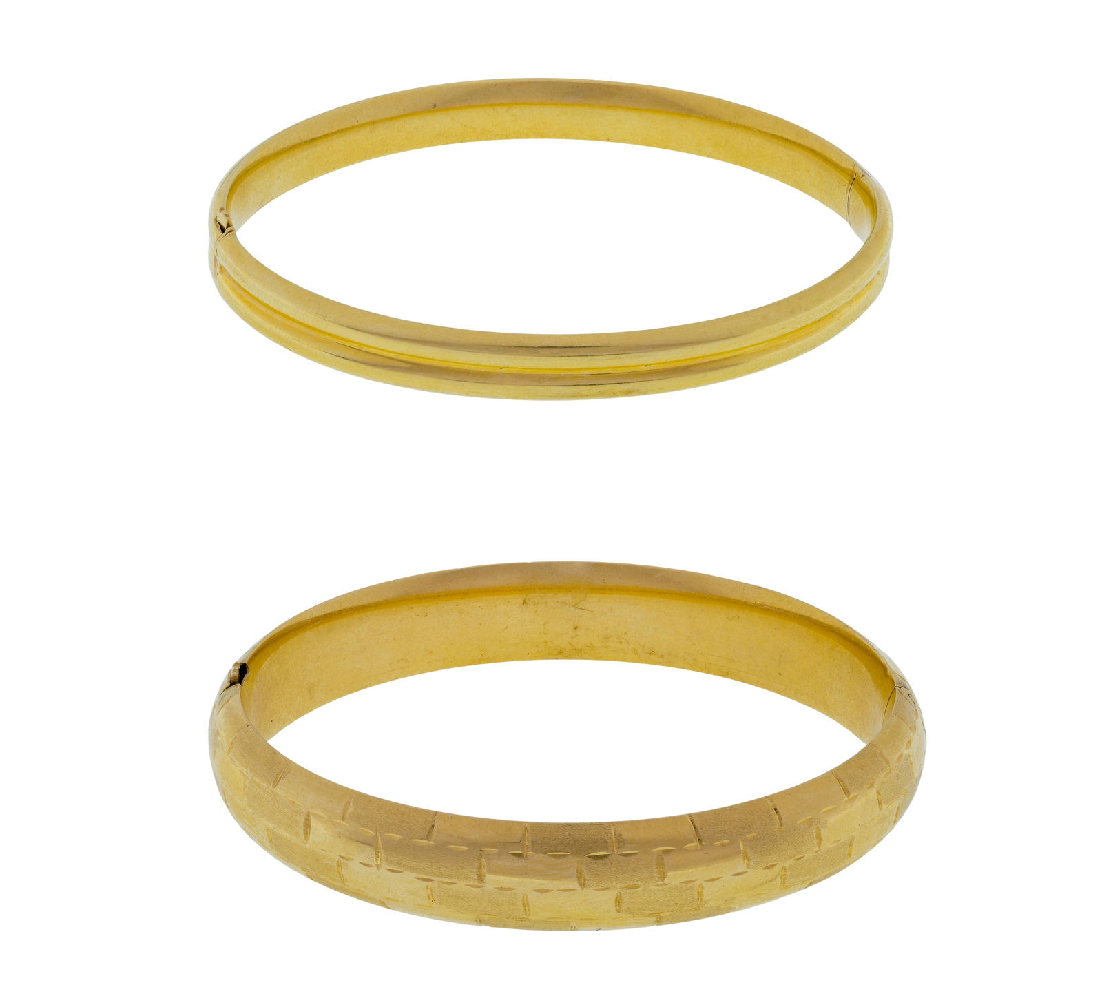 14k Yellow Gold Bangle Bracelets: 14k Yellow Gold Bangle Bracelets (2) items including a hinged bracelet with impressed designs, 0.375-inch wide and a double ring 0.25-inch wide, (both marked '14k') Property from: a Private