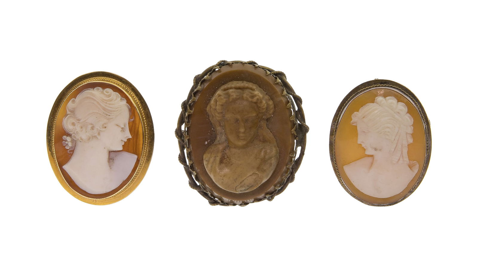 Gold, Silver and Metal Cameo Brooch Assortment: Gold, Silver and Metal Cameo Brooch Assortment (3) items including hand carved portraits (marked '14k', marked '800' silver) and a carved image in a brass-tone setting Property from: a Private