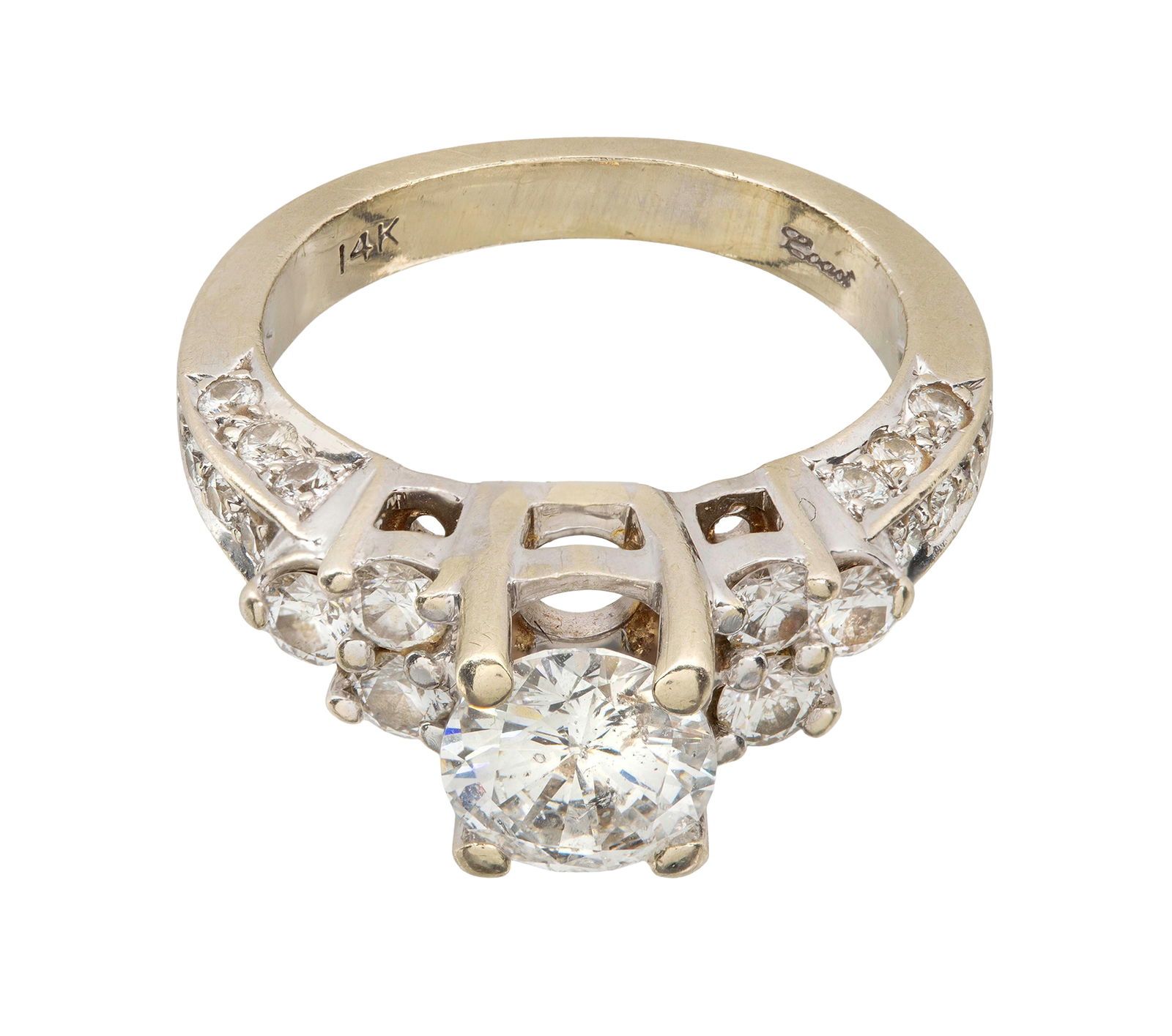 14k White Gold and Diamond Ring: 14k White Gold and Diamond Ring Having a high mount round cut center diamond weighing approximately 1.08 carats, G/H color, I-2 clarity, flanked on each side by three round cut diamonds and a