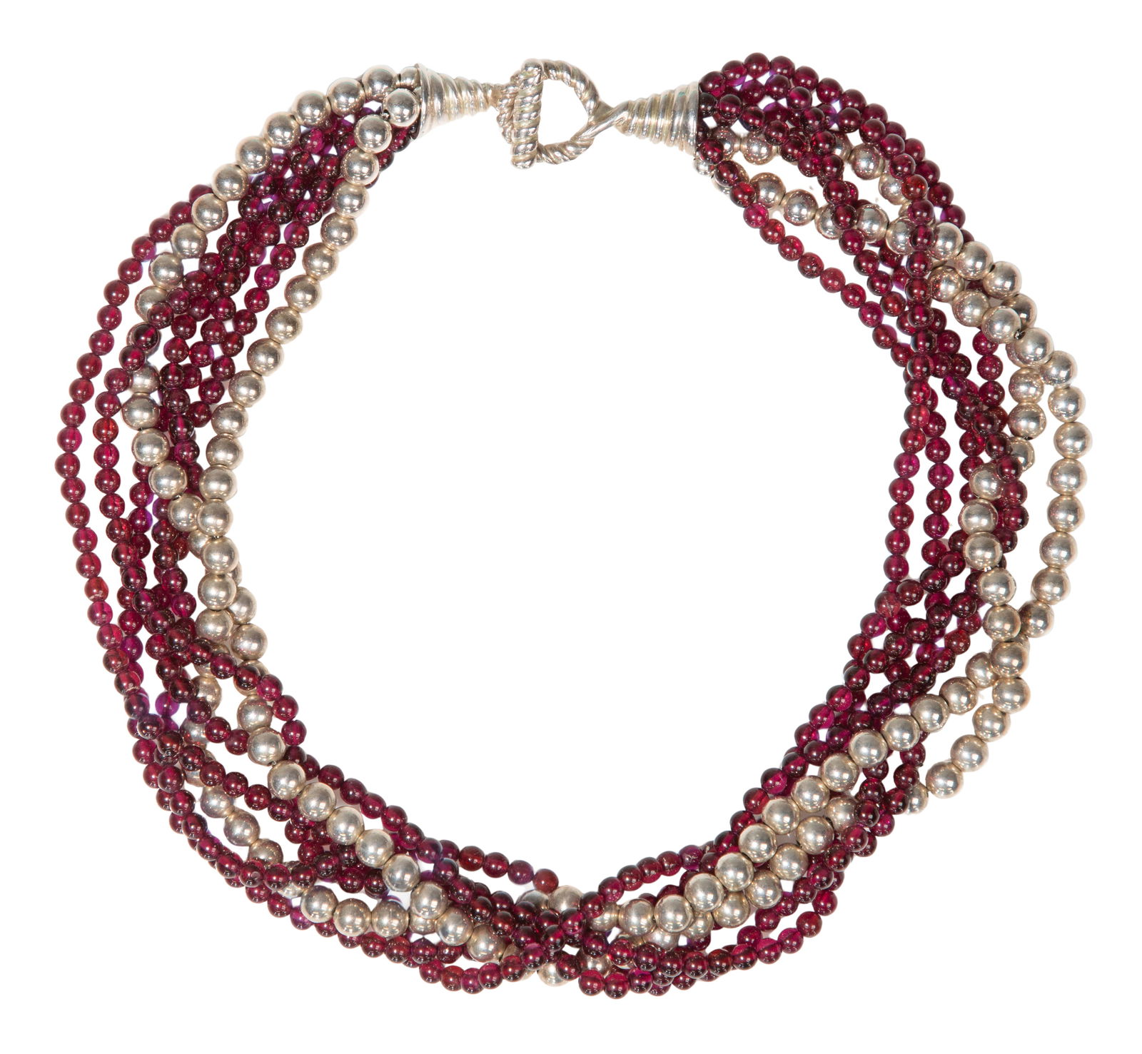 Tiffany & Co. Garnet and Sterling Silver Necklace: Tiffany & Co. Garnet and Sterling Silver Necklace Having twisted strands of bead work and a toggle clasp, including a pouch Property from: an Estate, Naperville, Illinois Length: 16 1/2