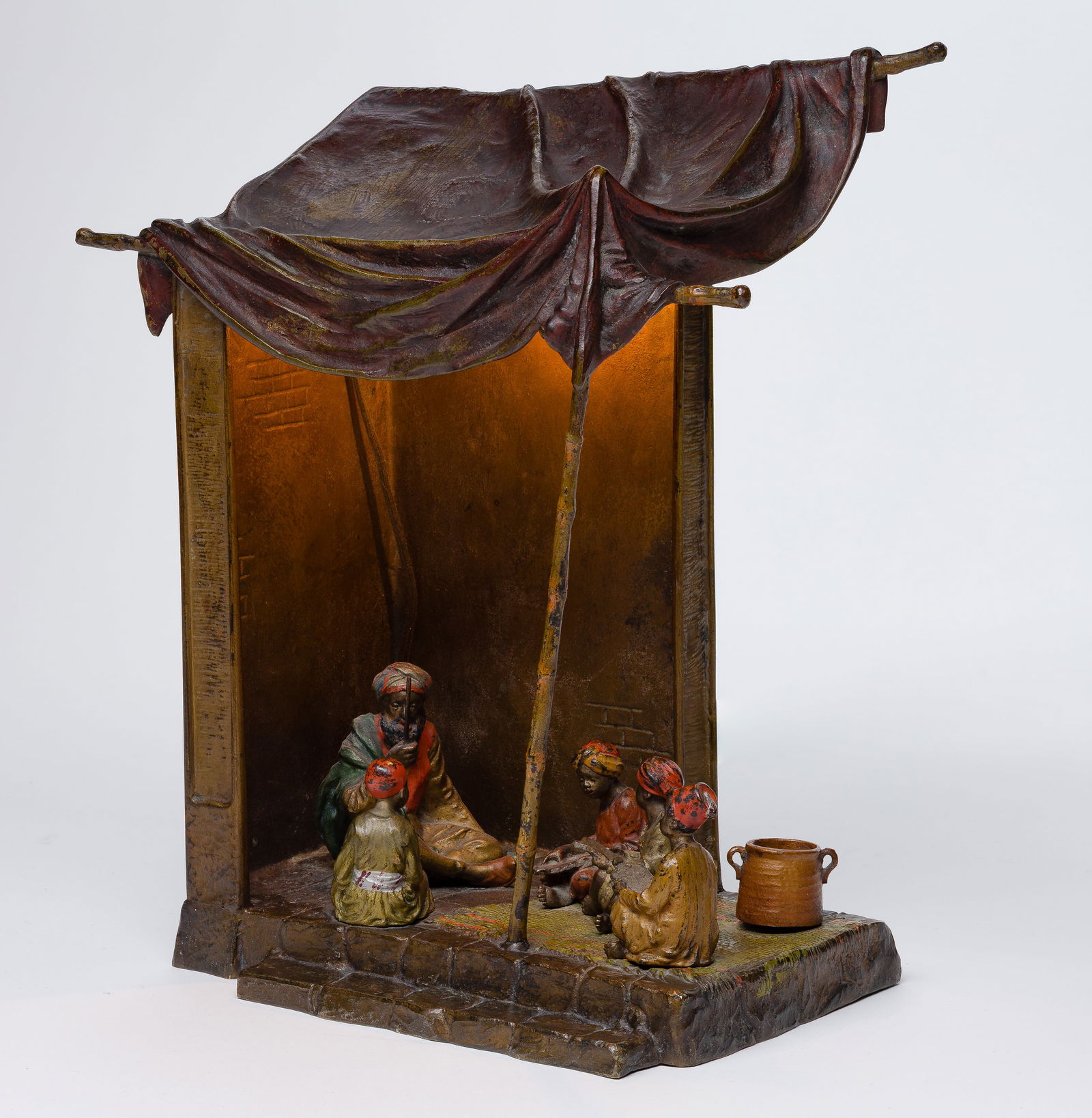 Style of Franz Xaver Bergmann (Austrian, 1861-1936) Cold Painted Bronze Lamp: Style of Franz Xaver Bergmann (Austrian, 1861-1936) Cold Painted Bronze Lamp Figural lamp depicting a Bedouin camp school Property from: an Estate, Glen Ellyn, Illinois Height: 11 inches,