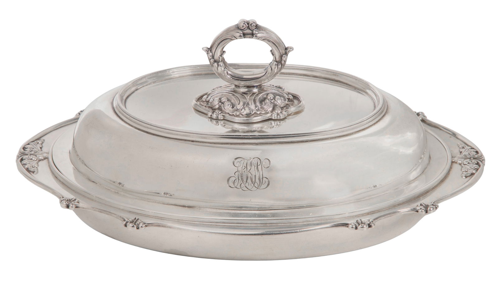 Tiffany Sterling Silver Tableware: Tiffany Sterling Silver Tableware An oval lidded serving dish having twist off handle for using lid as a separate dish (marked 'Tiffany & Co. Makers, 14468 5448, sterling silver, 925-1000') 