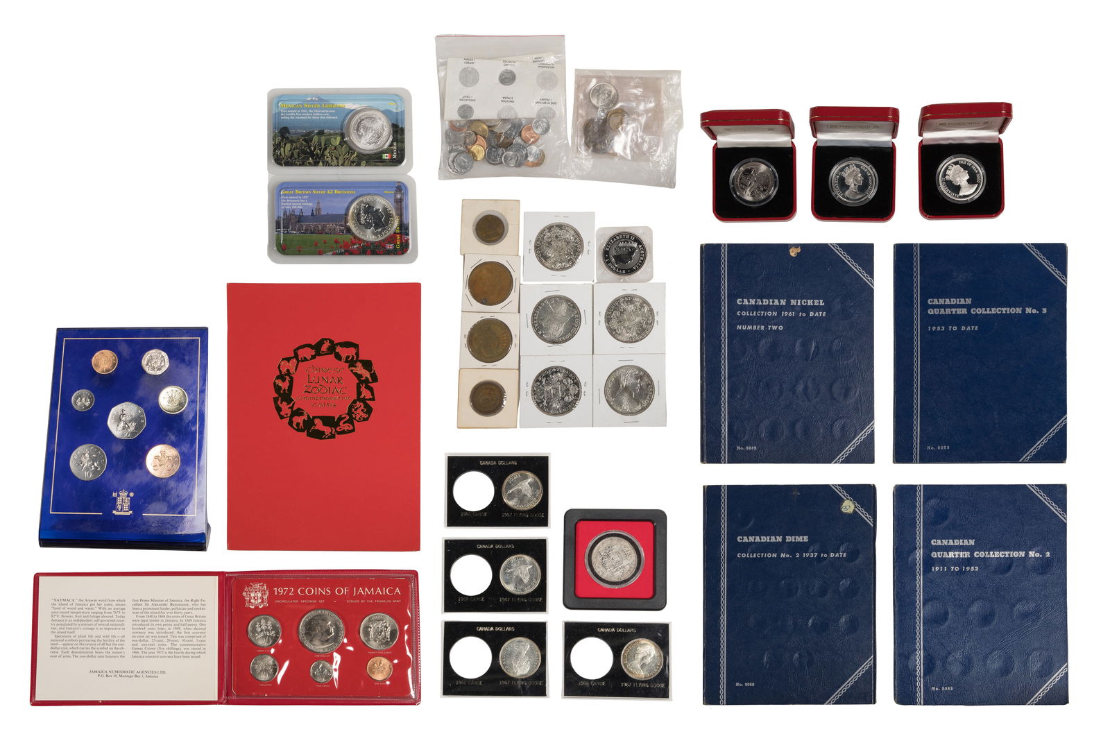 World: Coin Assortment: World: Coin Assortment Including an 1806 Carolus IV milled dollar, (5) 1780 Maria Theresa Thaler sterling silver re-strikes, (5) 1967 1$ Canadian flying geese, a 1993 Mexican Libertad, a $2 Great