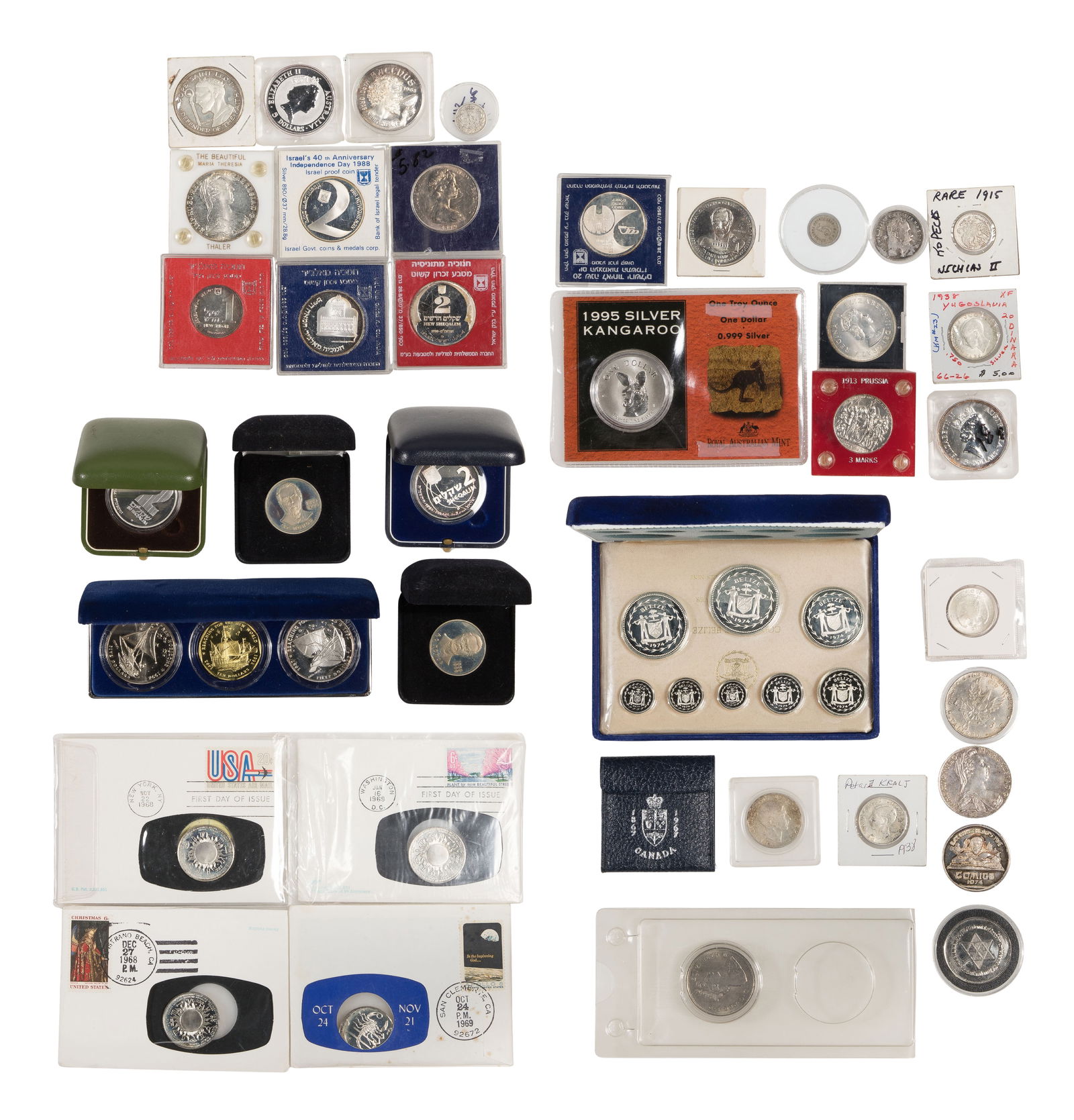 World: Silver Coins Assortment: World: Silver Coins Assortment Approximately (35) coins of varying purity, from countries including Russia, Yugoslavia, England, New Zealand and Israel, most in cases, slabs or boxes Property