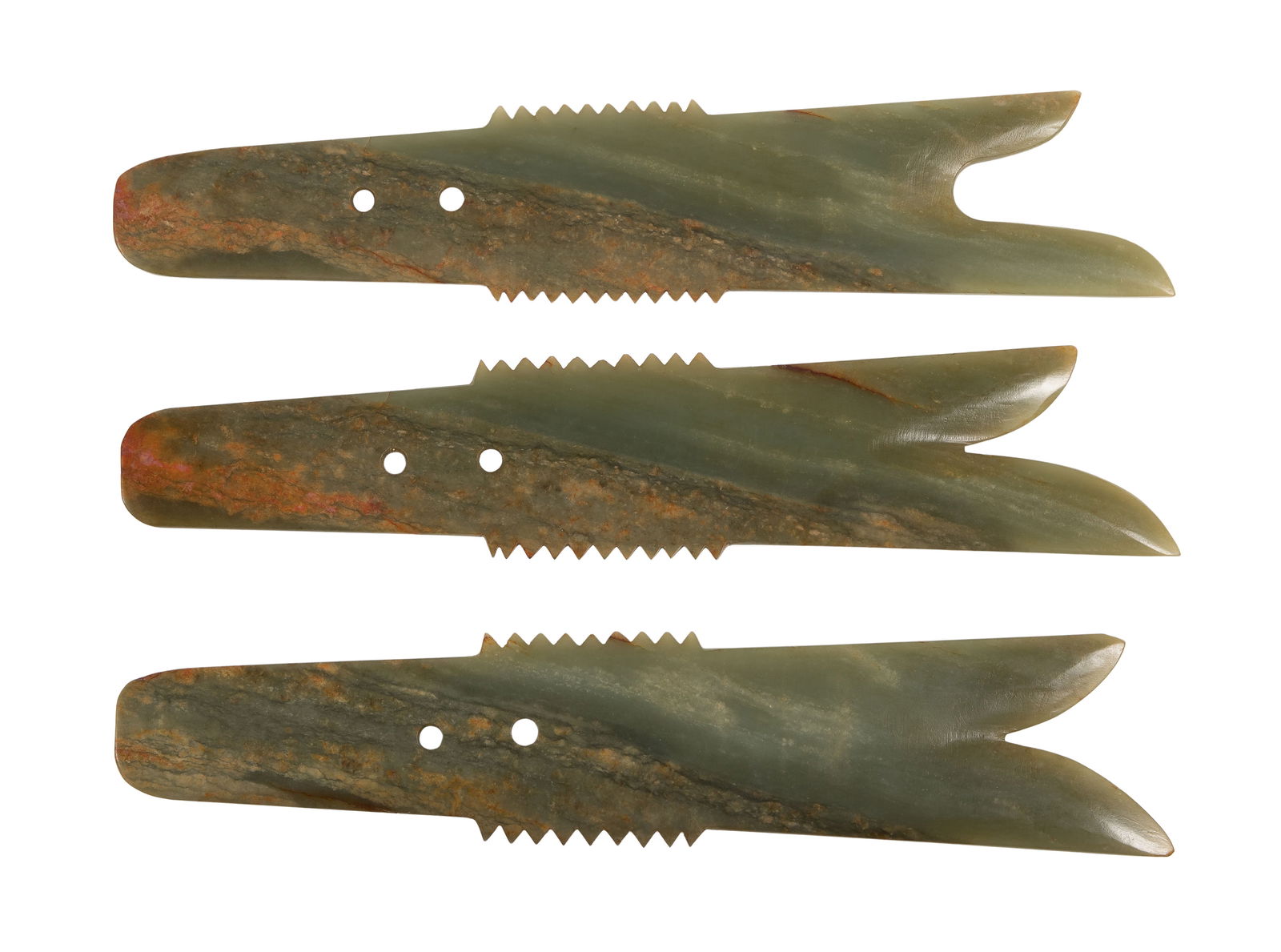 Asian Jadeite Jade Ceremonial Blades: Asian Jadeite Jade Ceremonial Blades (3) axe blades having detailed edging, two holes, stored in custom glass front display case Property from: a Private Collector, Naperville, Illinois 