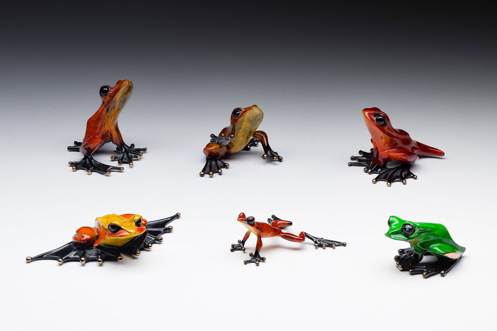 Tim Cotterill (British, b.1950) Bronze Frog Sculptures: Tim Cotterill (British, b.1950) Bronze Frog Sculptures (6) enameled frogs in various colors, sizes and poses, all having cast 'Frogman' mark and signed underside Property from: an Estate,
