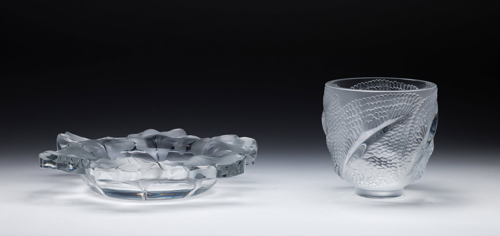 Lalique Crystal Bowls: Lalique Crystal Bowls (2) items including an Andromeda tall bowl and a Capucines centerpiece bowl, both marked on undersides Property from: a Private Collector, Evanston, Illinois Height: 2 3/8 inches