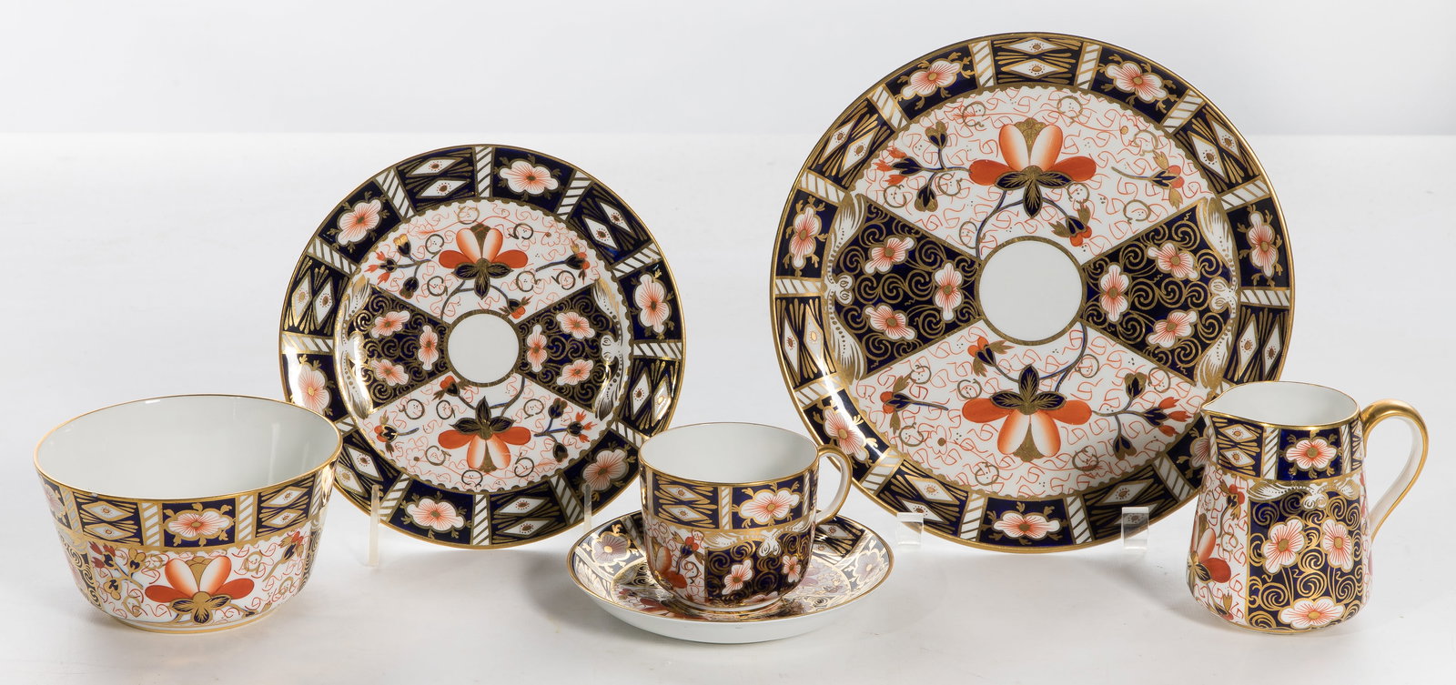 Royal Crown Derby Imari China Service: Royal Crown Derby Imari China Service (40) items including (2) 9-inch luncheon plates, (12) 7-inch salad plates, (12) 2 1/2-inch coffee cups, (12) 5 1/2-inch coffee saucers, (1) 5-inch round bowl