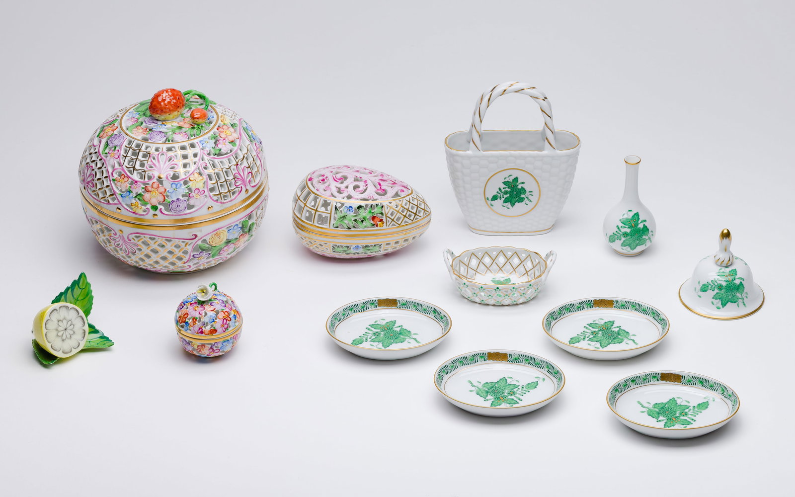 Herend Porcelain Assortment: Herend Porcelain Assortment (9) items including a set of four small oval dishes, (4) reticulated items including a covered potpourri bowl, an egg-shaped covered box, a two-handled basket and a