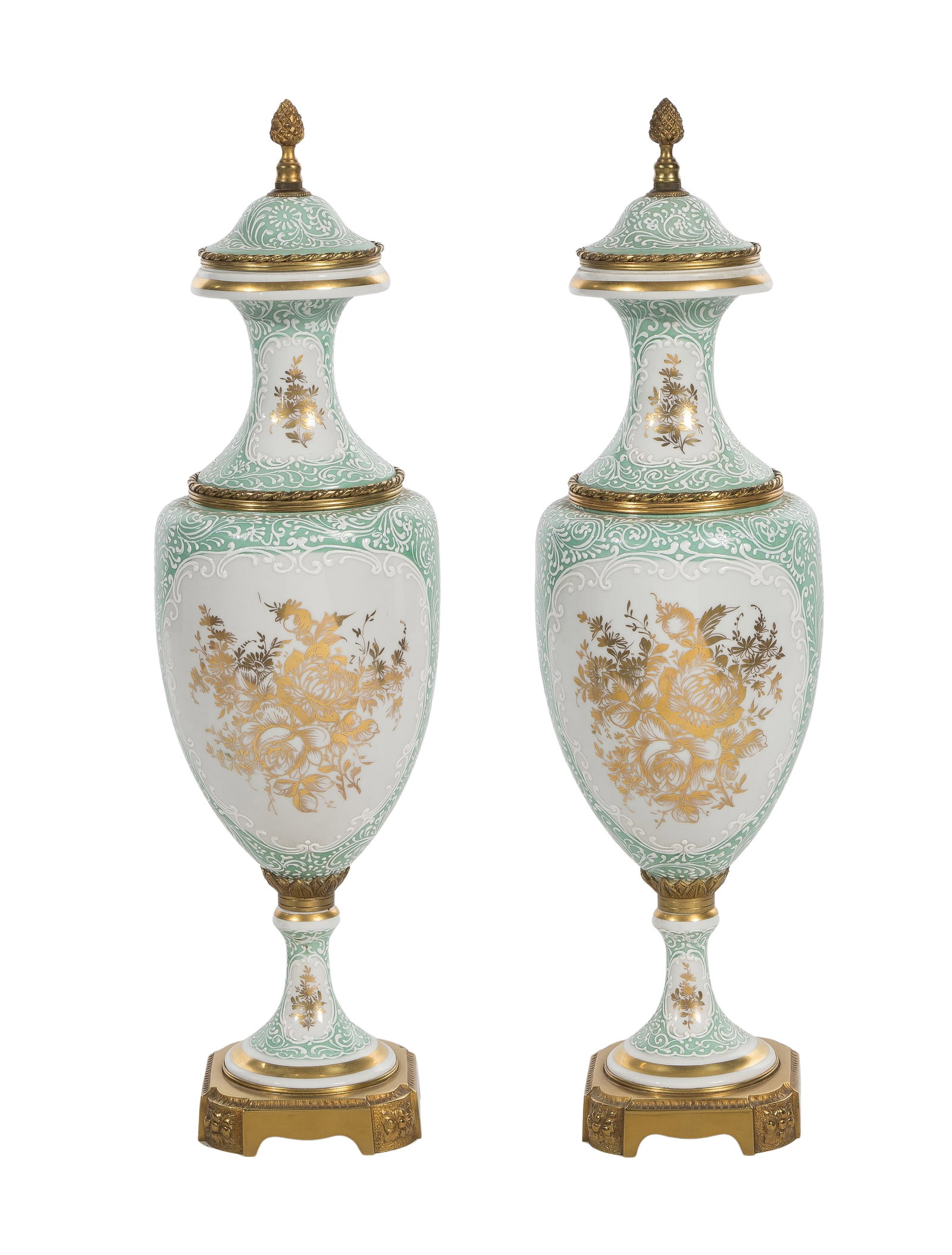 French Sevres Style Porcelain Urns: French Sevres Style Porcelain Urns A pair having unidentified maker mark and 'Made in France / Hand Painted' on undersides, brass bases and mounts Property from: an Estate, River Forest, Illinois Heig