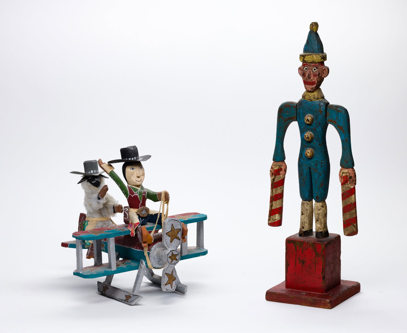 Delbert Buck (American, 20th Century) Folk Art: Delbert Buck (American, 20th Century) Folk Art (2) total items including the biplane having figures signed 'Delbert Buck' underside; together with a standing figure whirligig, initial signed and