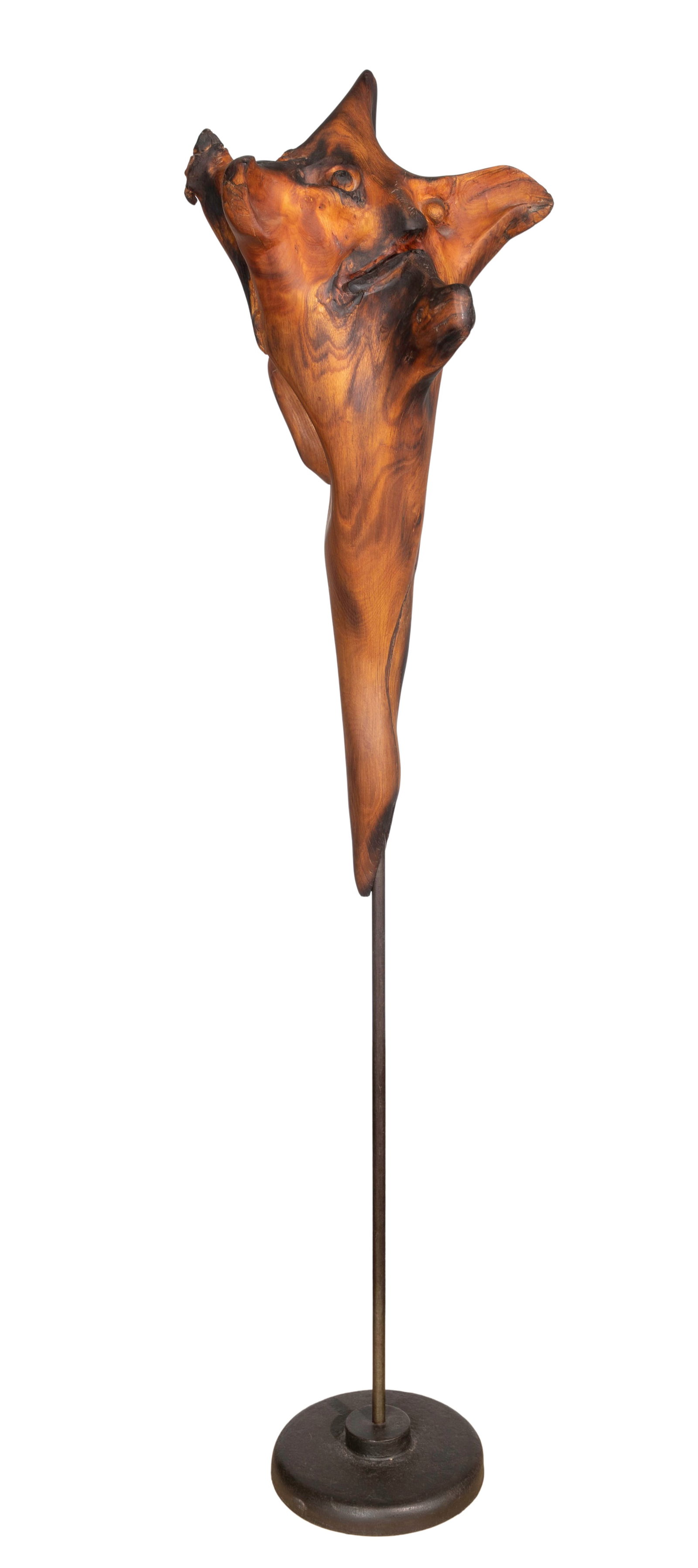 Carved Wood Sculpture: Carved Wood Sculpture Undated, unsigned burnished abstract animal form, mounted on metal stand Property from: an Estate, Chicago (Wrigleyville), Illinois Height: 63 inches, Width: 14 inches 