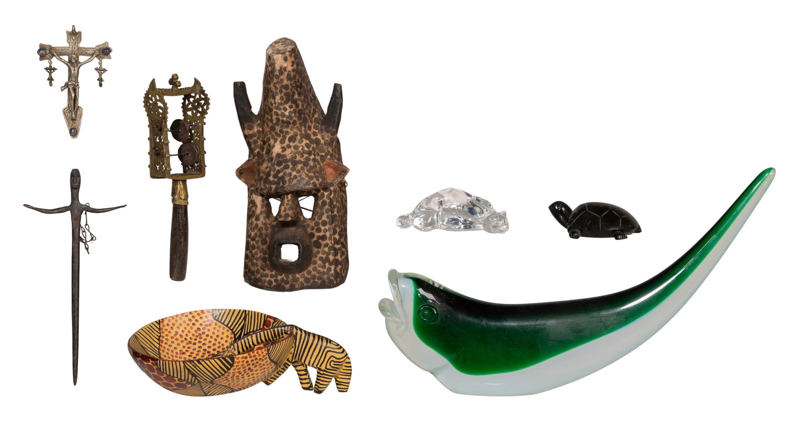 Decorative Object Assortment: Decorative Object Assortment (8) items including a Steuben crystal recumbent cat, a zebra themed carved wood and gourd bowl, a carved stone turtle, a tribal face mask, an iron crucifix, a pectoral