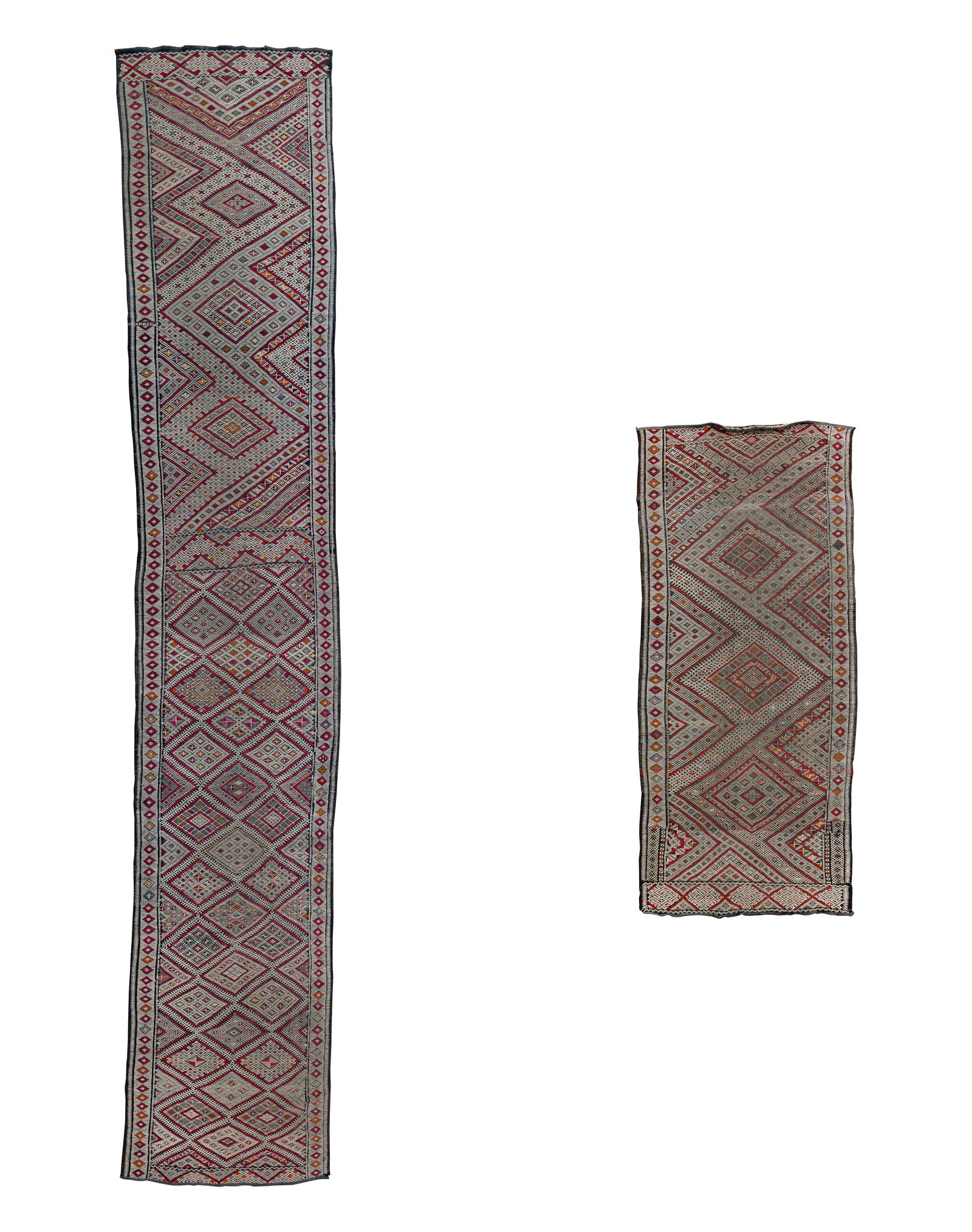 Flat Weave Wool Rugs: Flat Weave Wool Rugs (2) like items consisting of flat woven runners having an abstract geometric pattern in hues of red, orange, yellow, purple and black, a signature woven into the border of