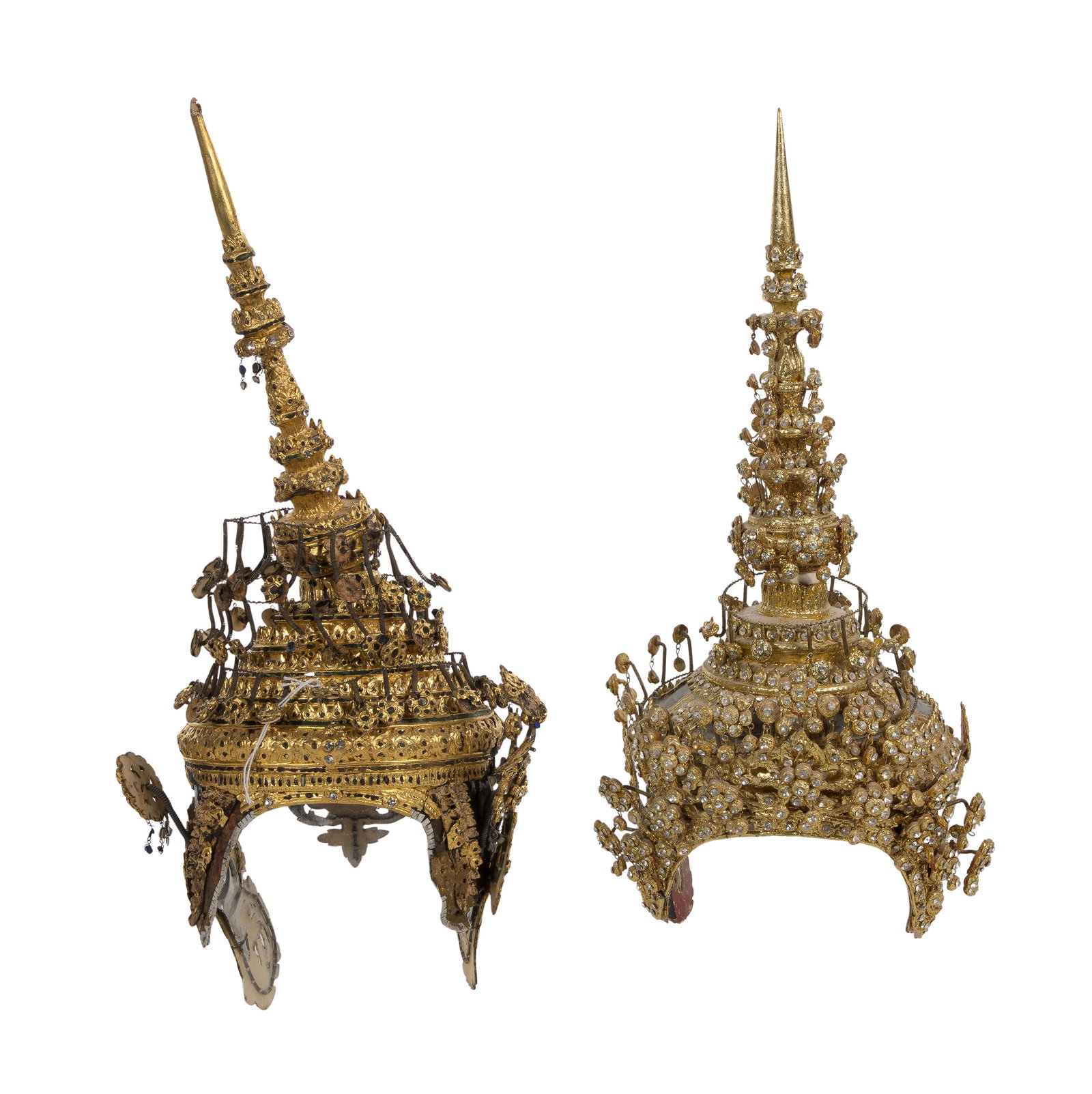 Thai Dance Headdresses: Thai Dance Headdresses (2) items, one having gold-tone composite over lacquer and metal supports heavily encrusted with rhinestones, the other having cut foil and glass inlay decoration over