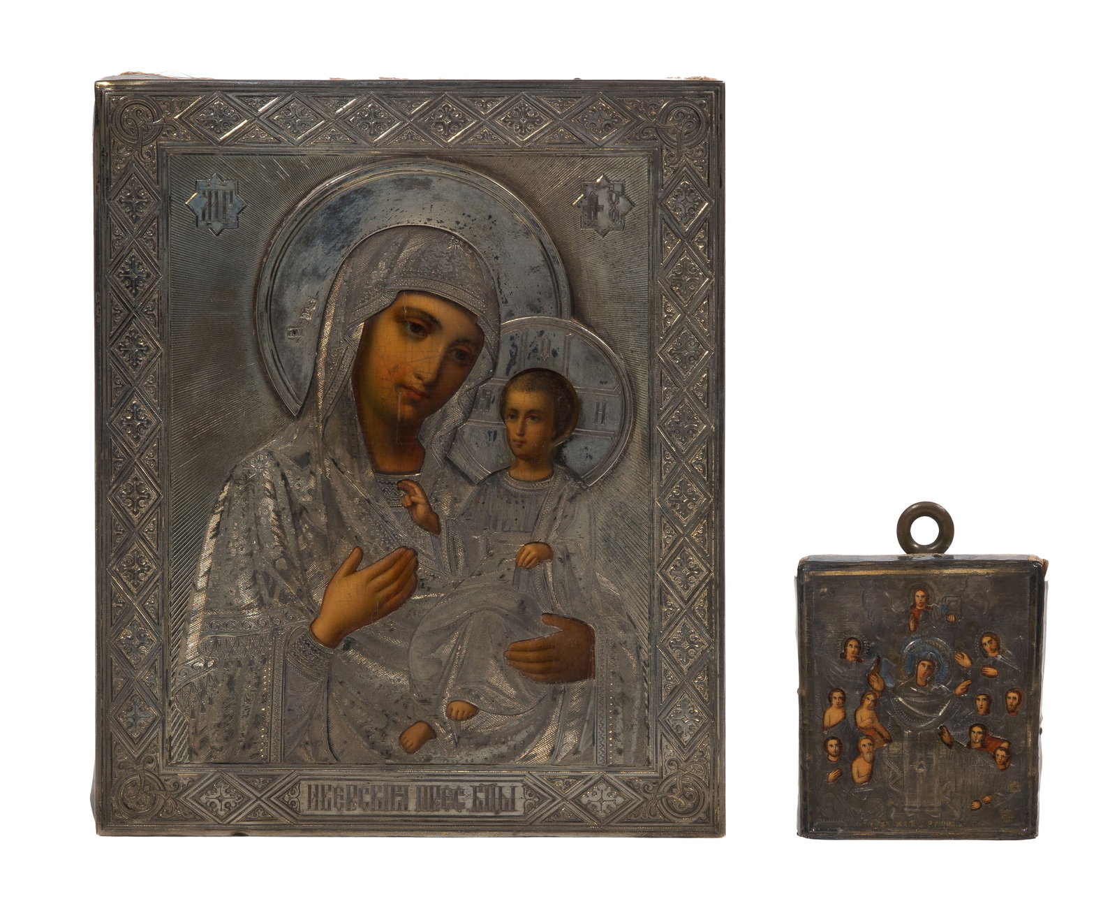 Russian Silver Icons: Russian Silver Icons (2) items, both hand painted on wood behind repousse and engraved oklads, both stamped '84', including an Our Lady of Kazan with Christ Child and a small Virgin surrounded by